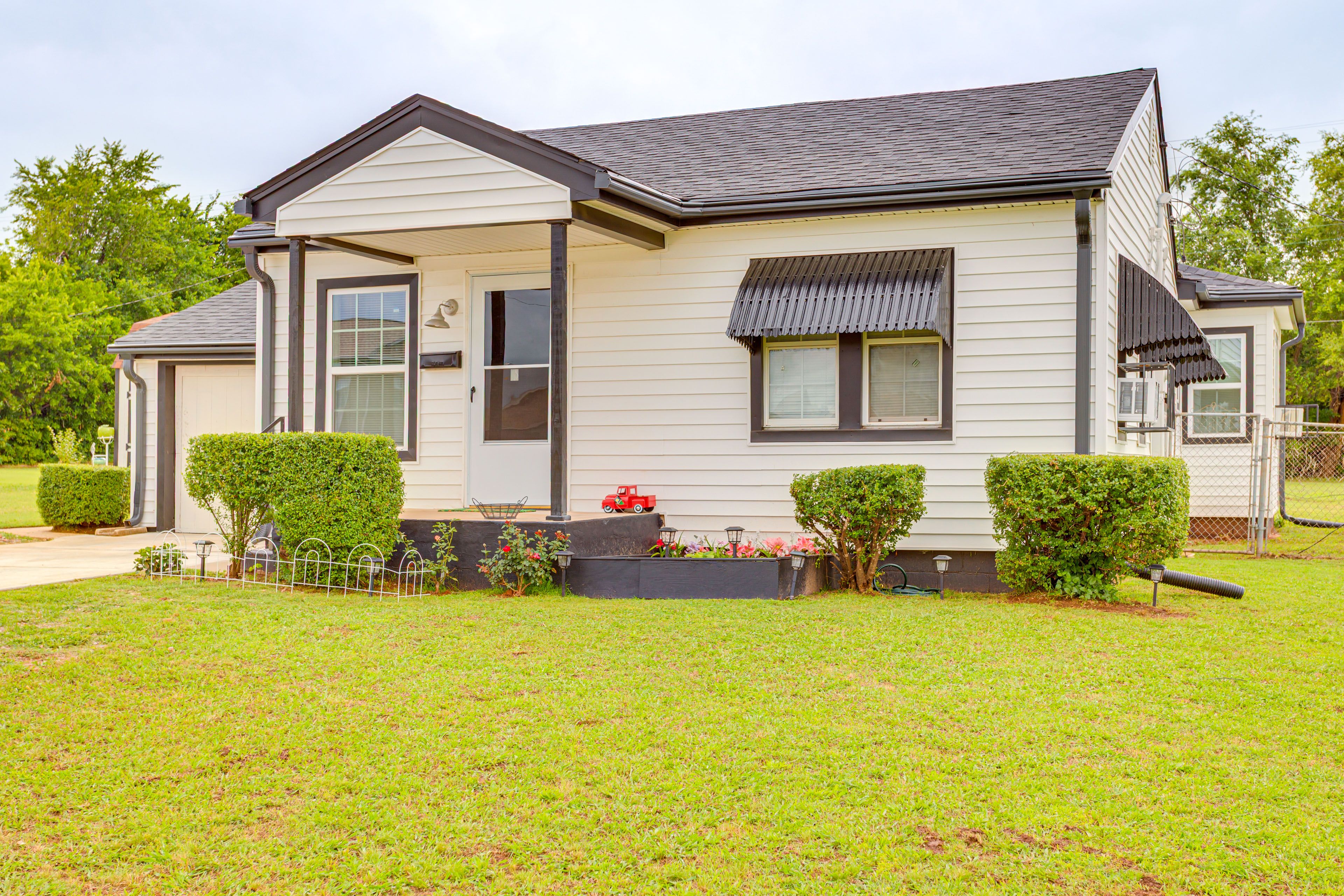 Exterior | Driveway (4 Vehicles) | Free Street Parking