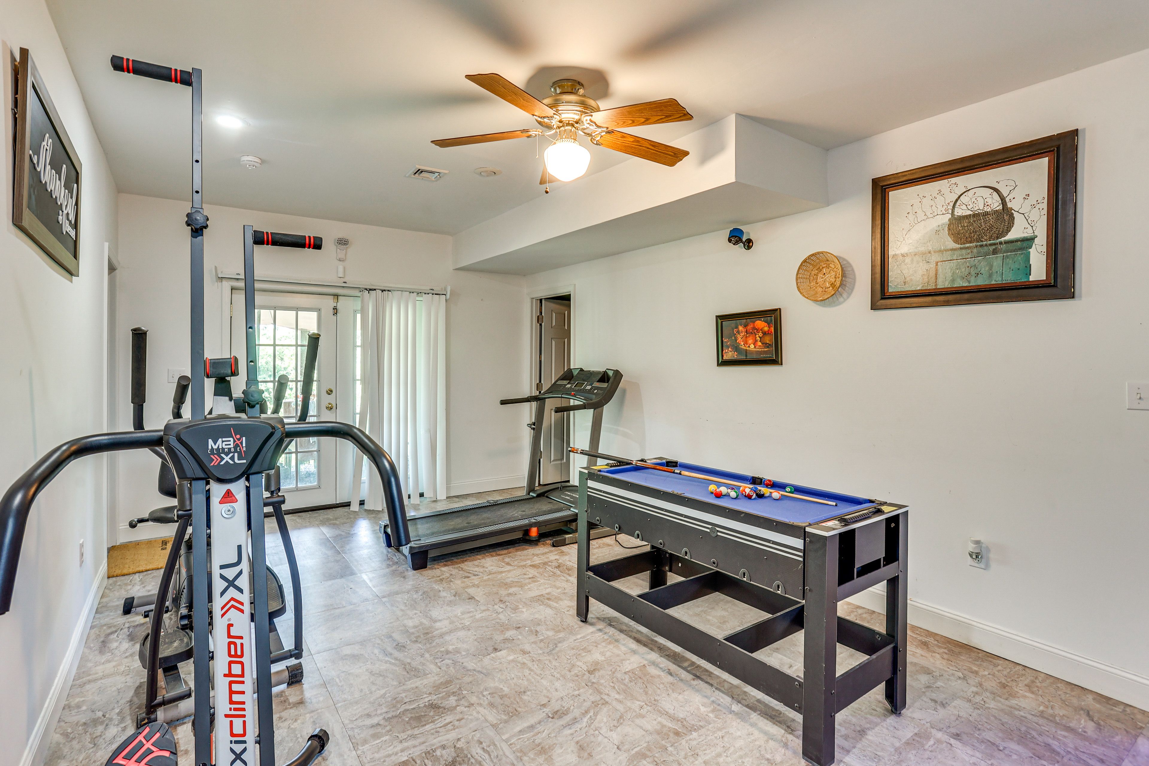 Pool/Ping-Pong Table & Exercise Equipment | Basement Level