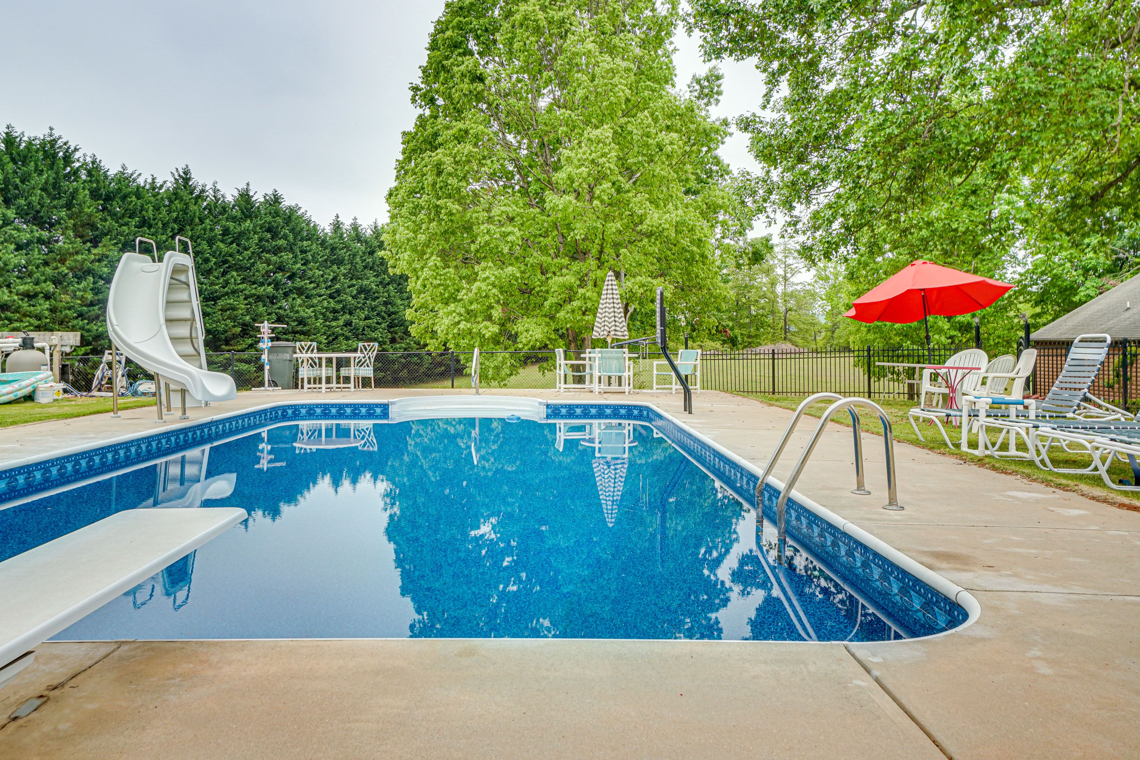Community Amenities | Pool w/ Slide & Basketball Hoop | Outdoor Dining Areas