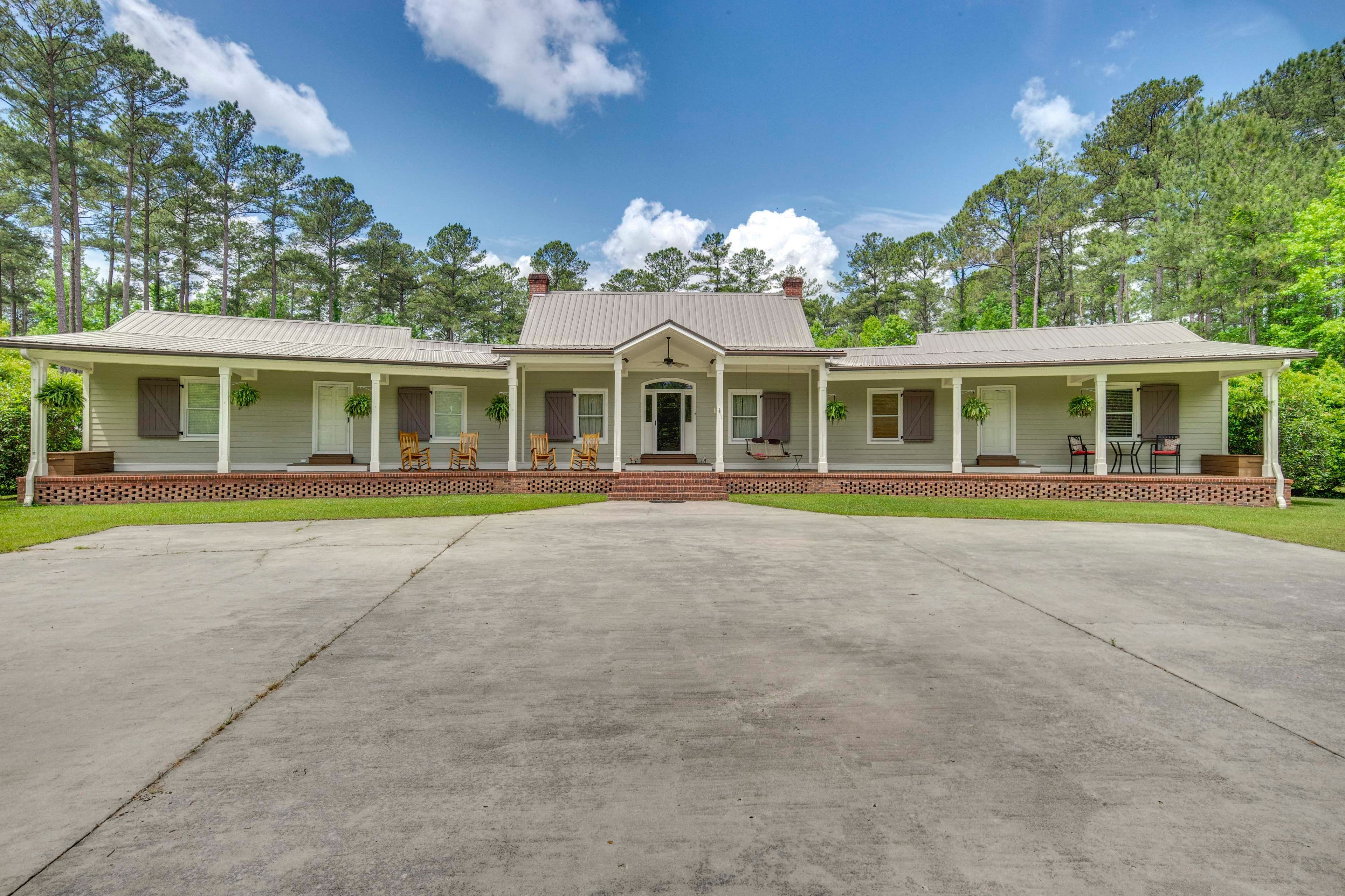 Exterior | Covered Front Porch | Rocking Chairs | Forested Views