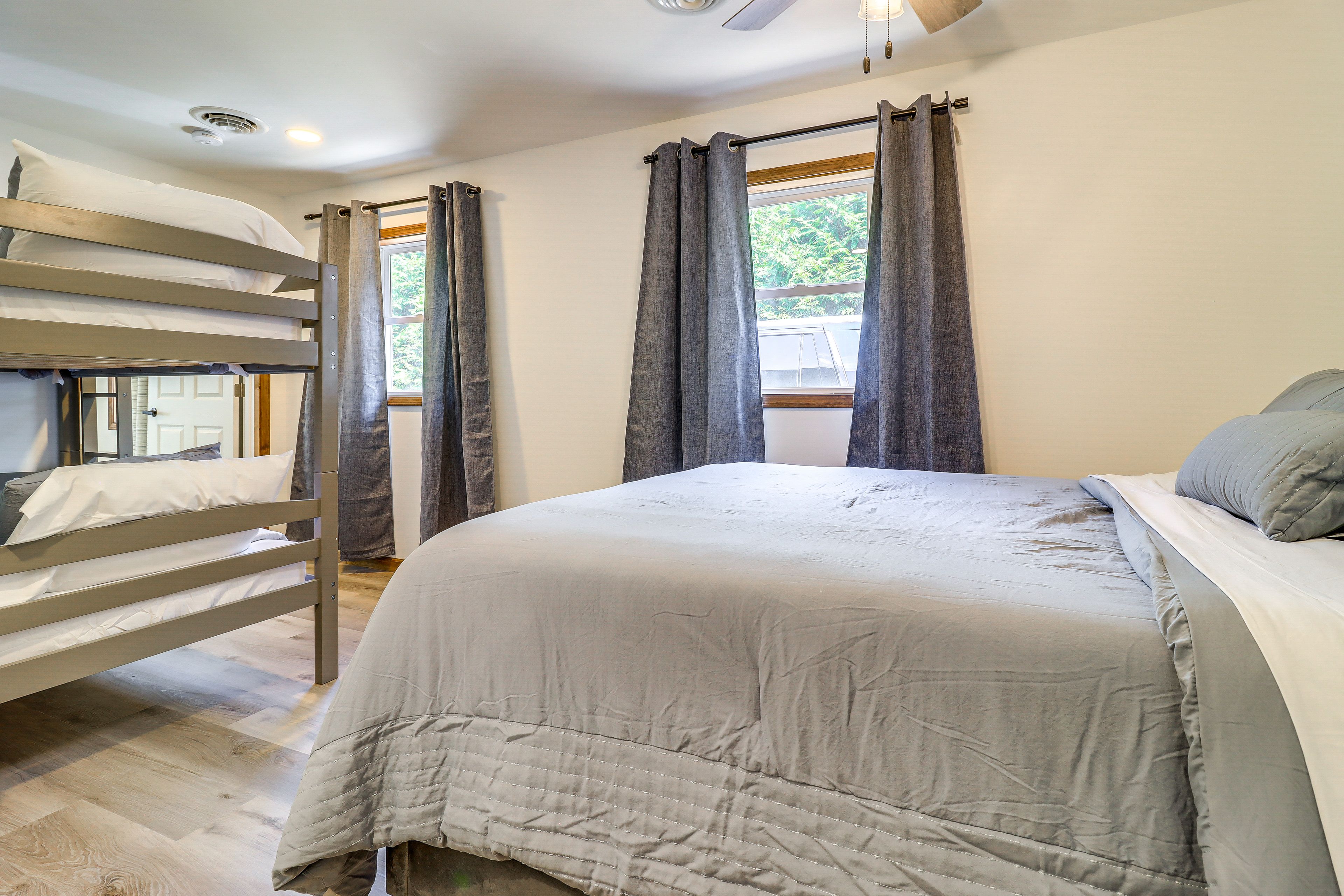 Bedroom 1 | Queen Bed | Twin Bunk Bed | Linens Provided | Ceiling Fans