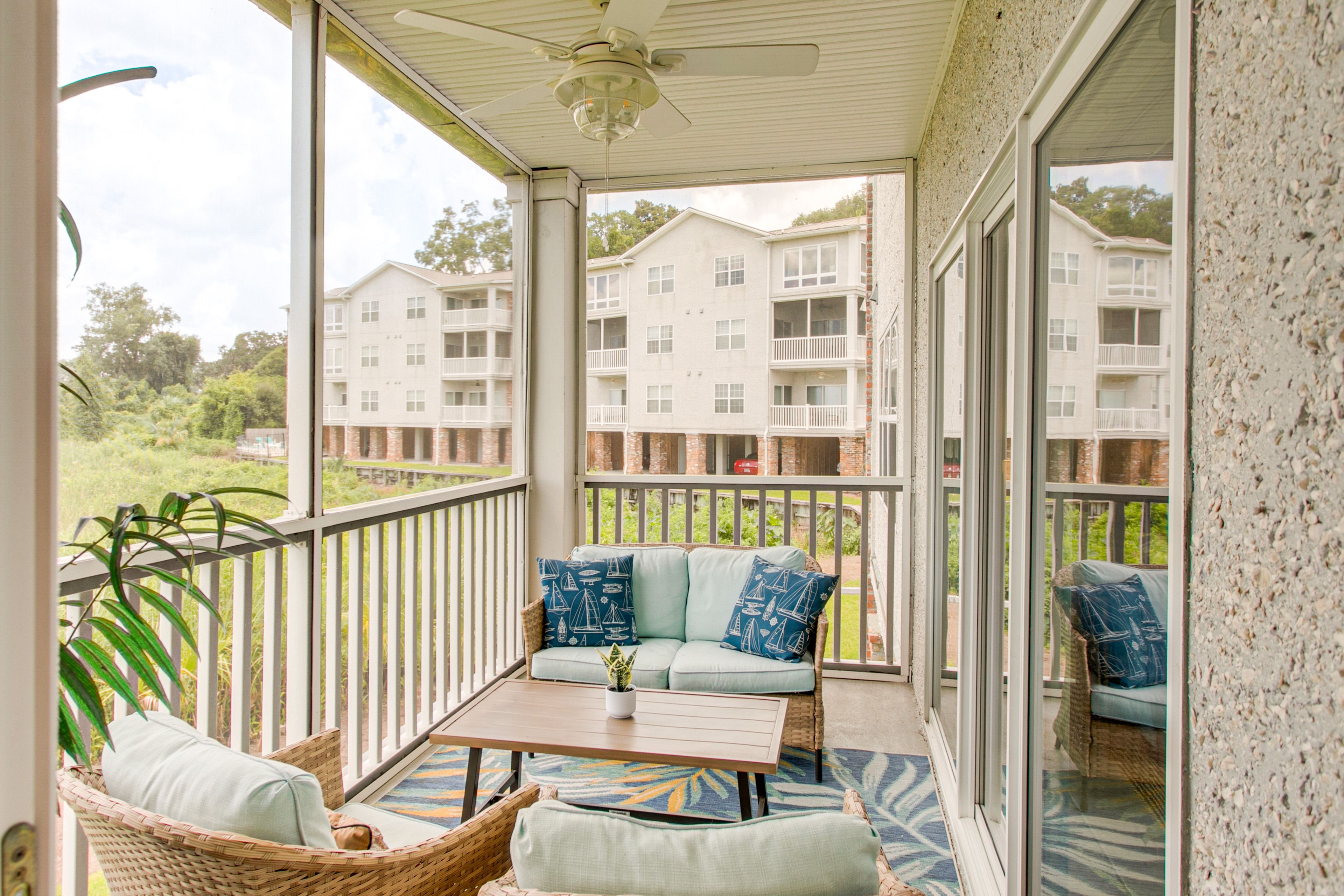 Screened-In Balcony | Outdoor Seating | Marsh Views