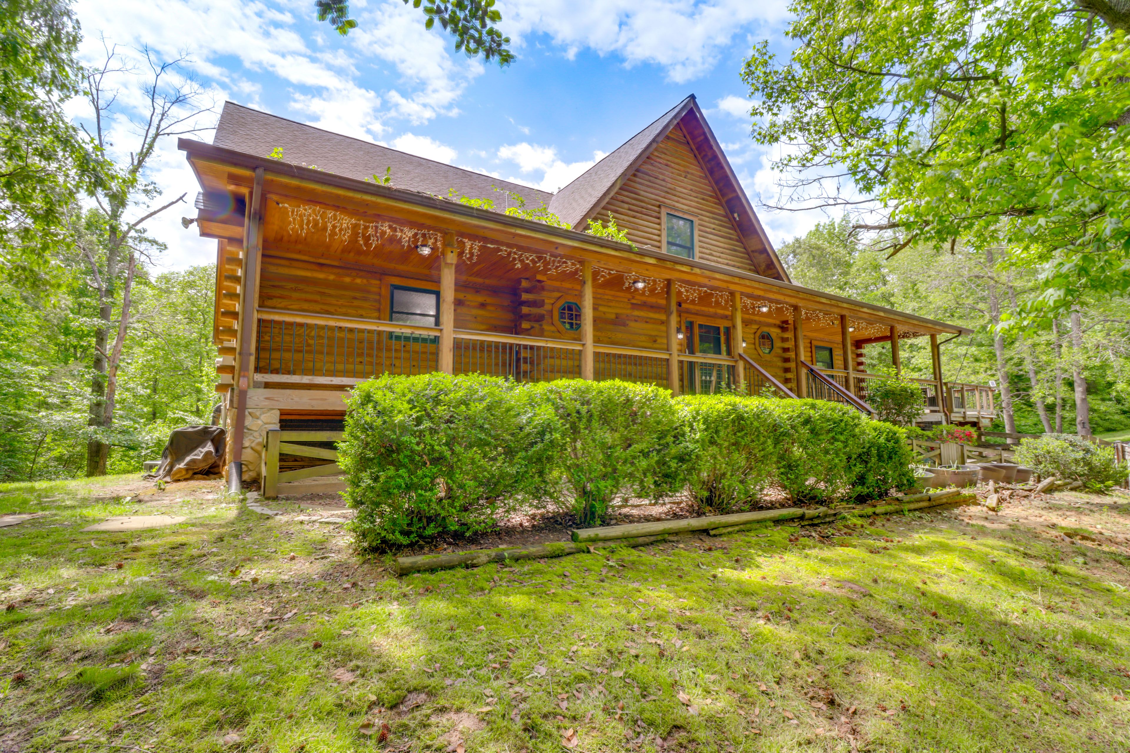 Cabin Exterior | Wood-Burning Fire Pit | Tire Swing