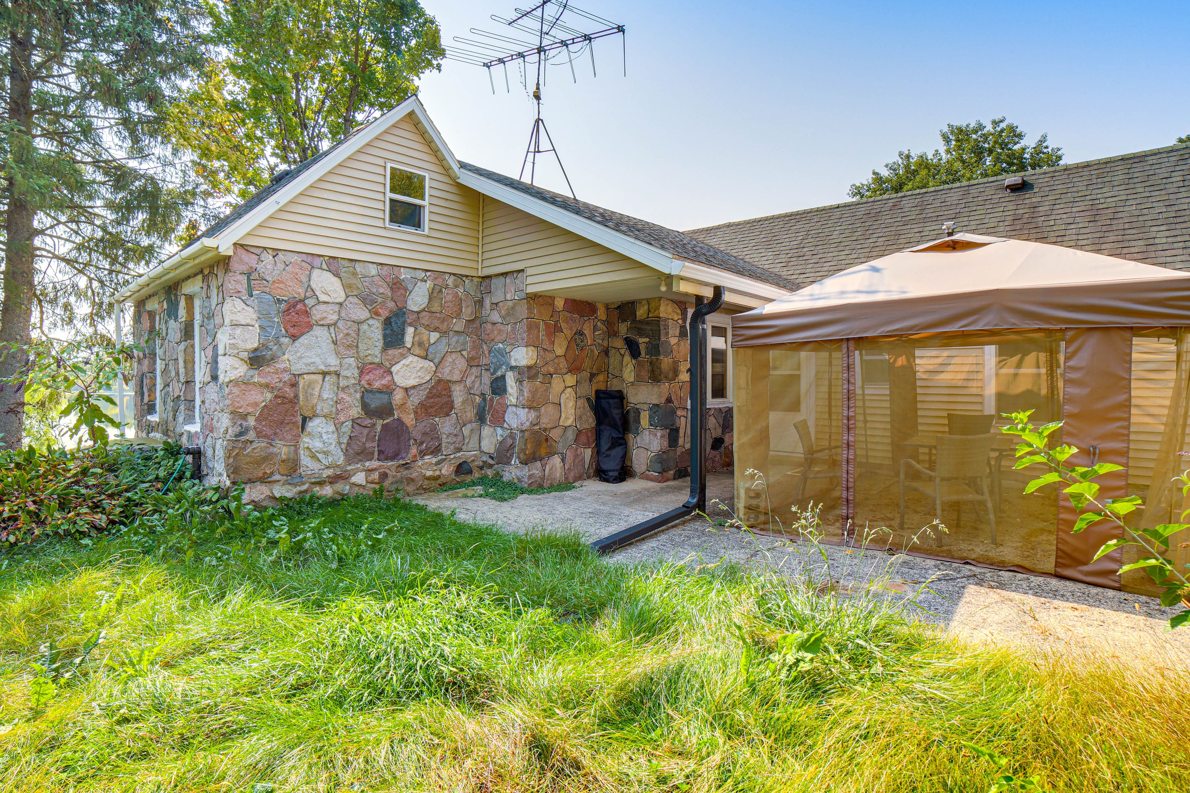 Cottage Exterior | Patio w/ Shade Tent | Addt'l Dining Area