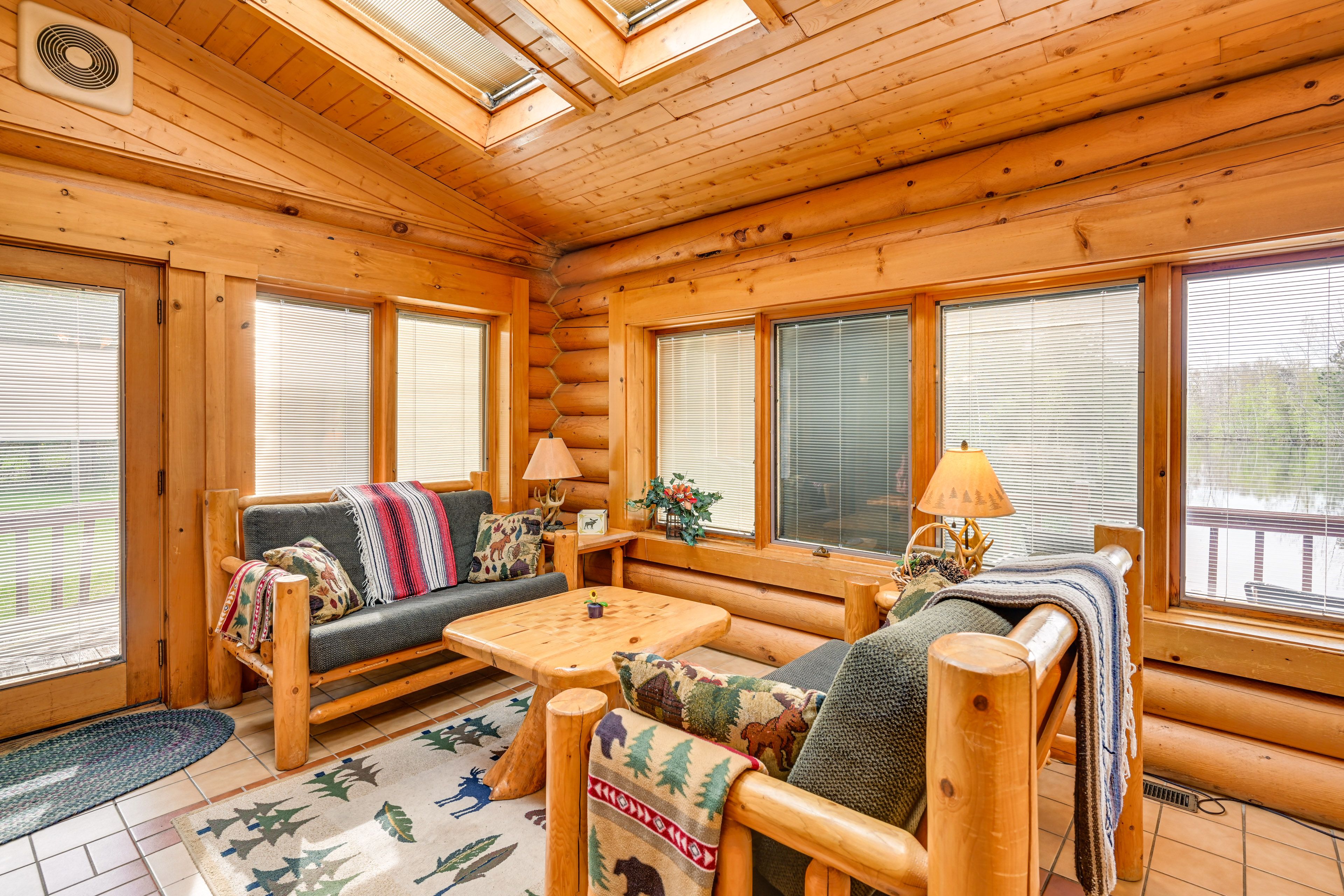 Sunroom | Dining Table | Dedicated Bar Area | Lounge Space | 1st Floor