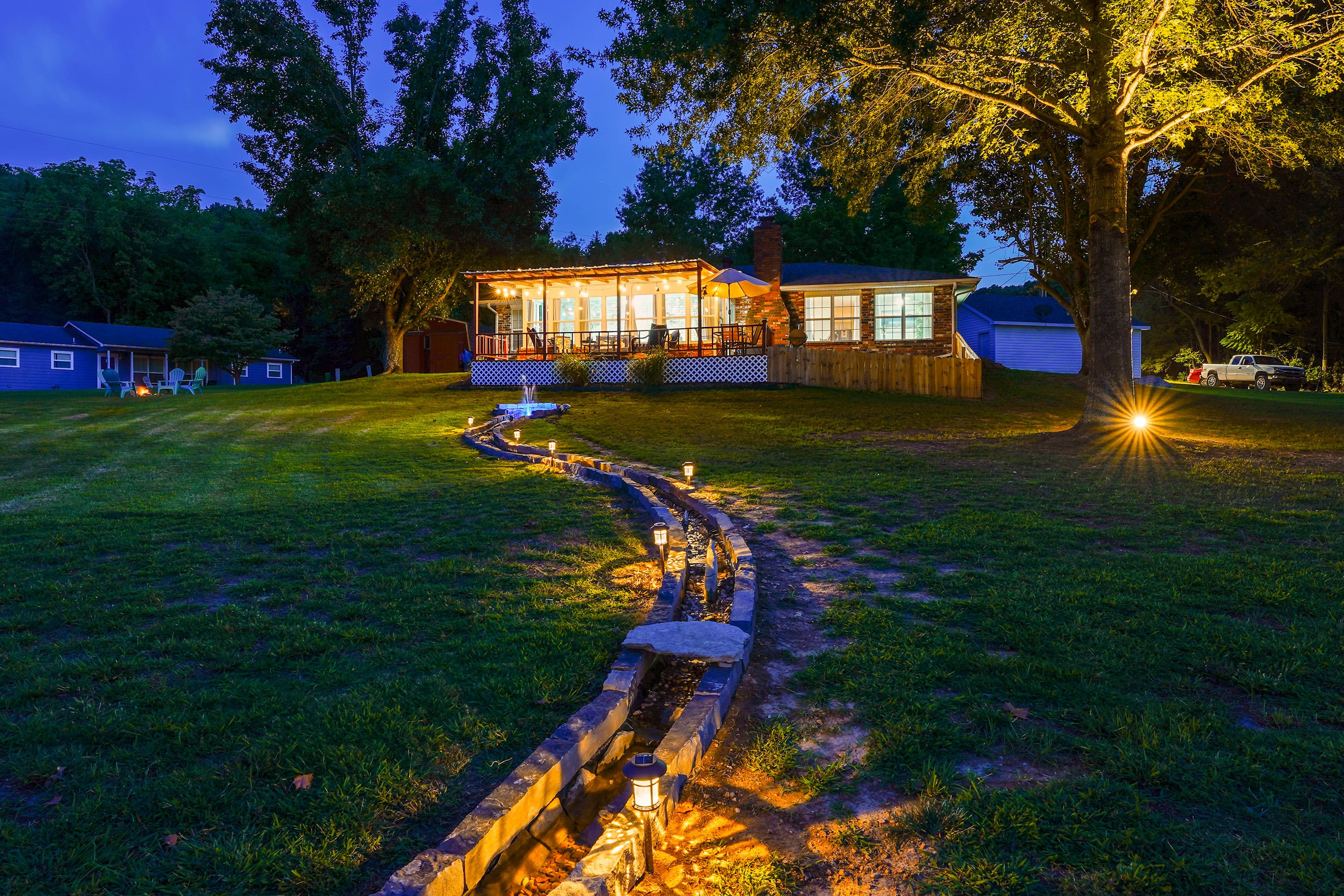 Nighttime Exterior | Fountain, Creek, & Waterfall