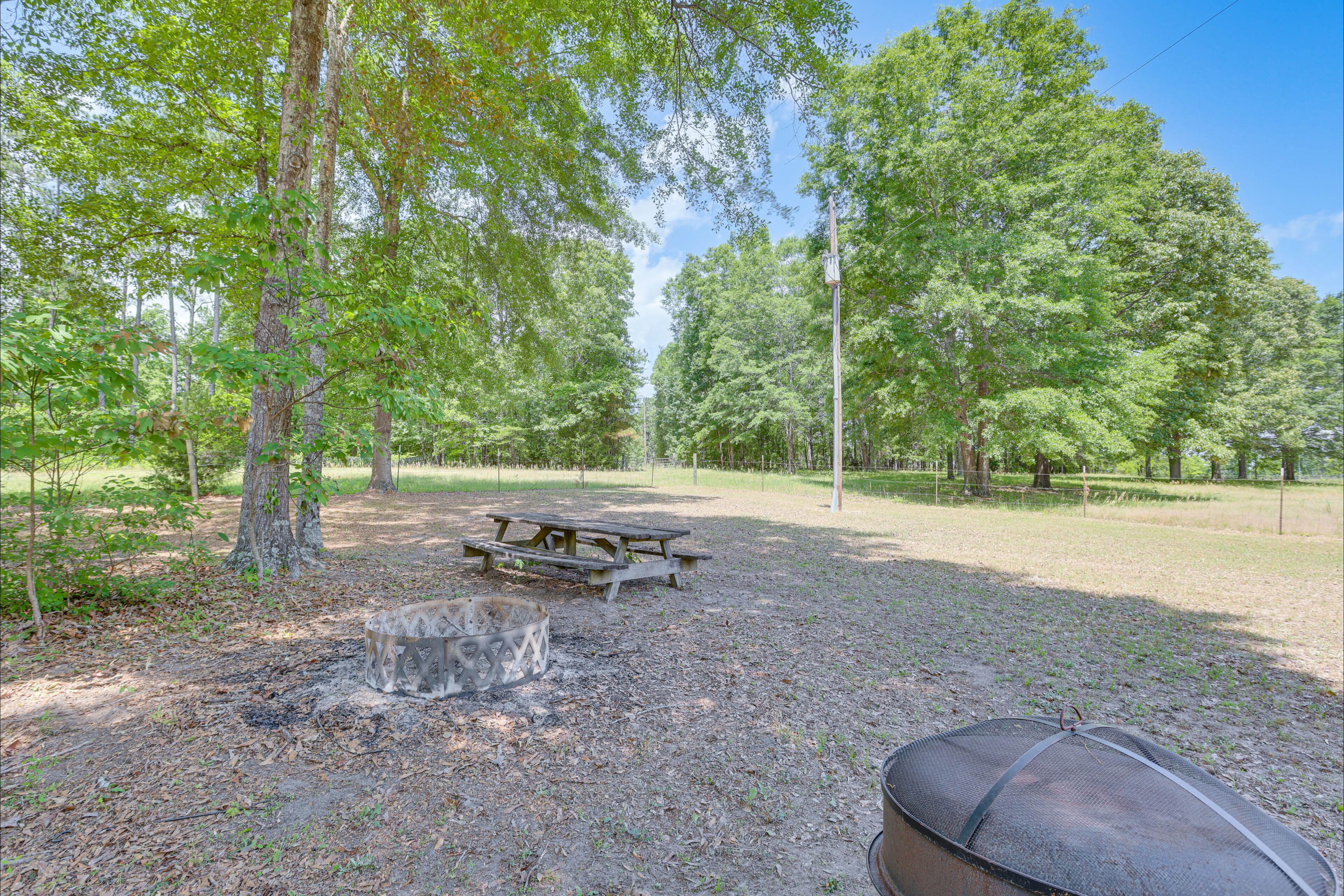 Cottage Exterior | Picnic Table | Wood-Burning Fire Pit
