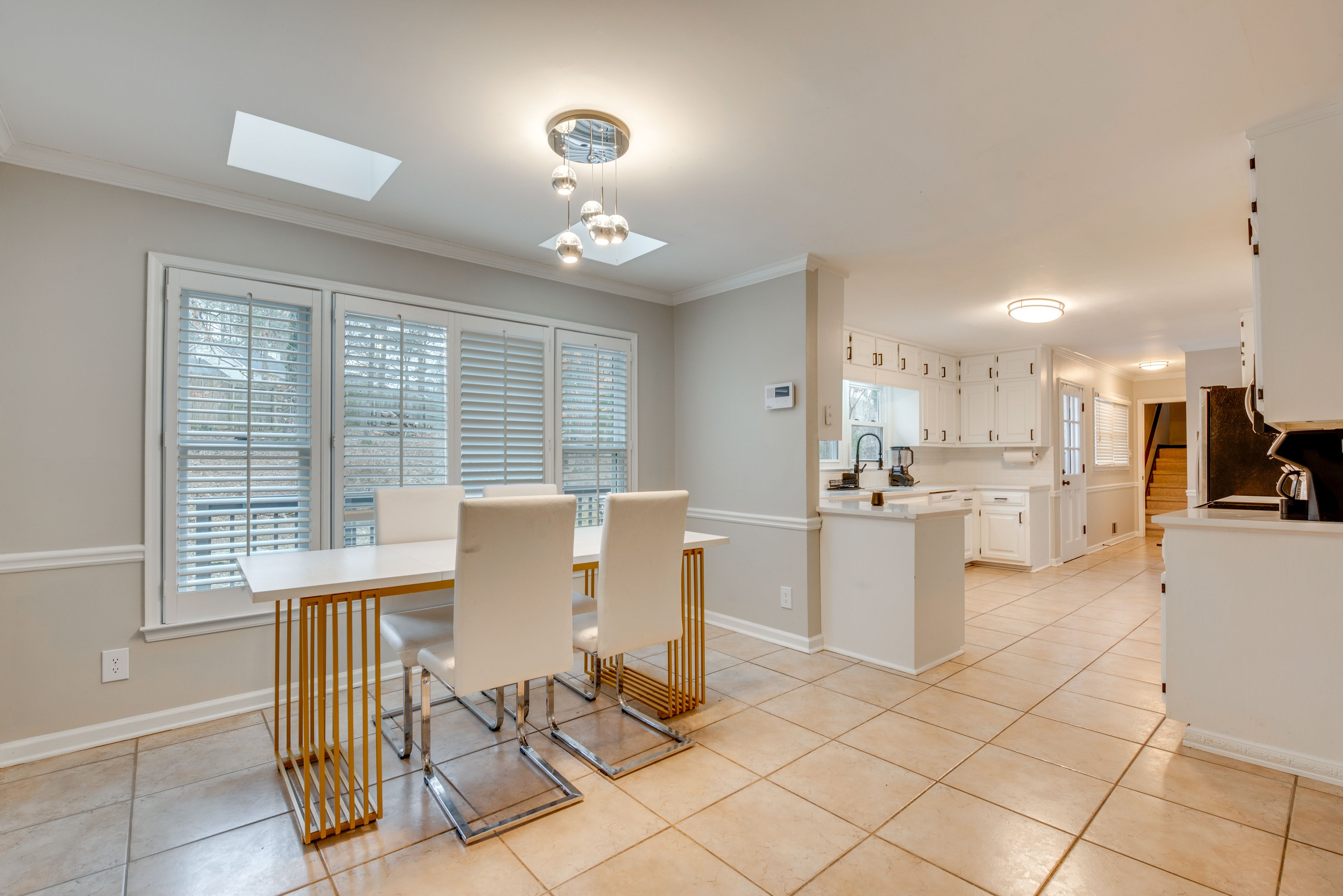 Dining Area | Dishware & Flatware | Central A/C & Heat | 1st Floor