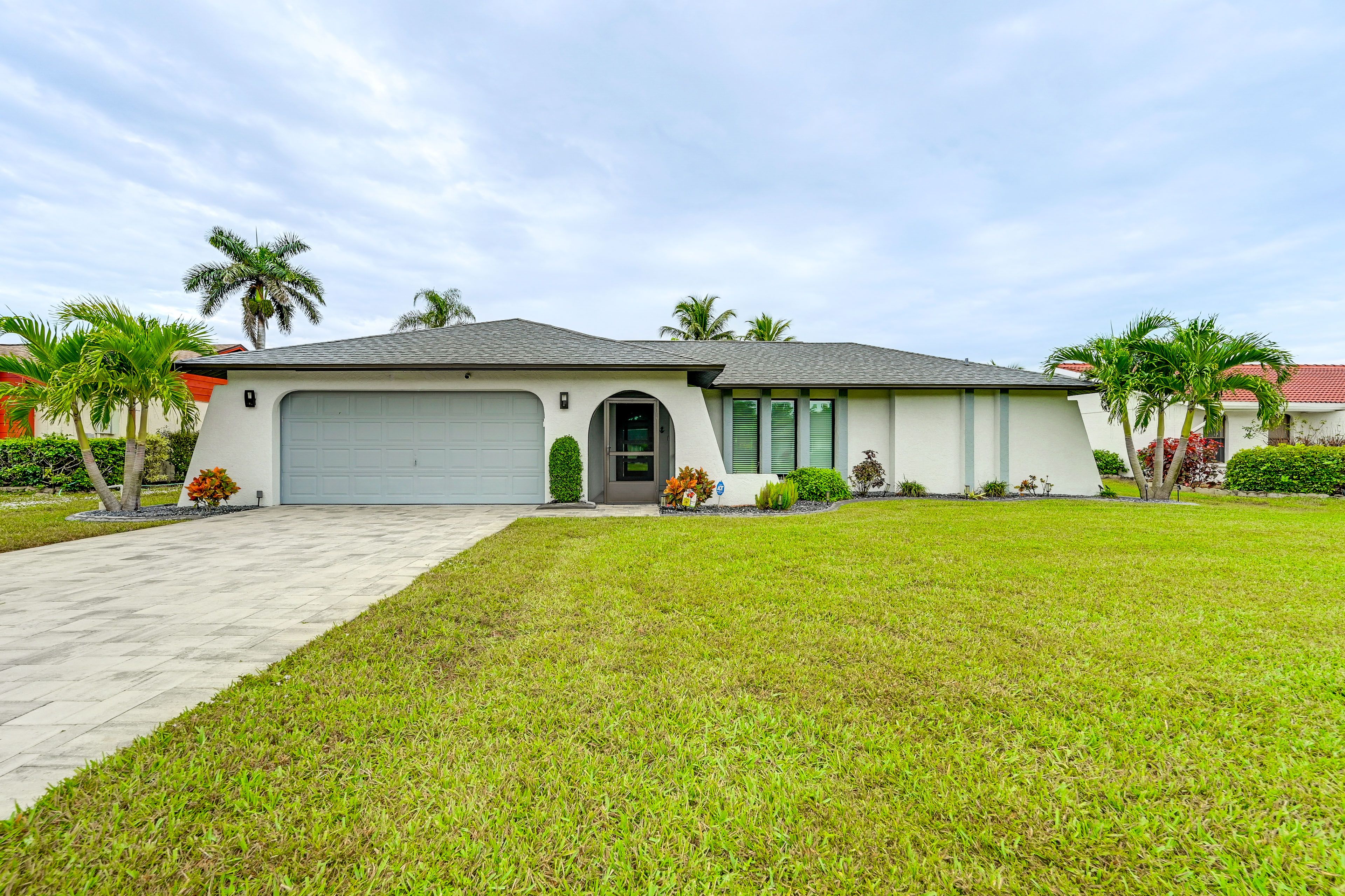 Parking | Garage (2 Vehicles) | Driveway (2 Vehicles) | EV Charger