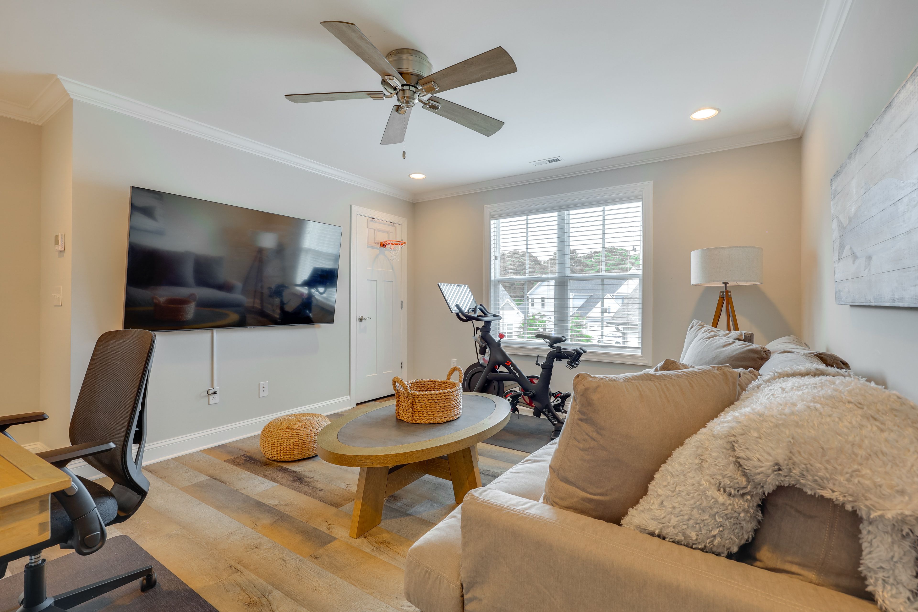 Family Room | Desk w/ 3 Monitors | Peloton Bike | Smart TV