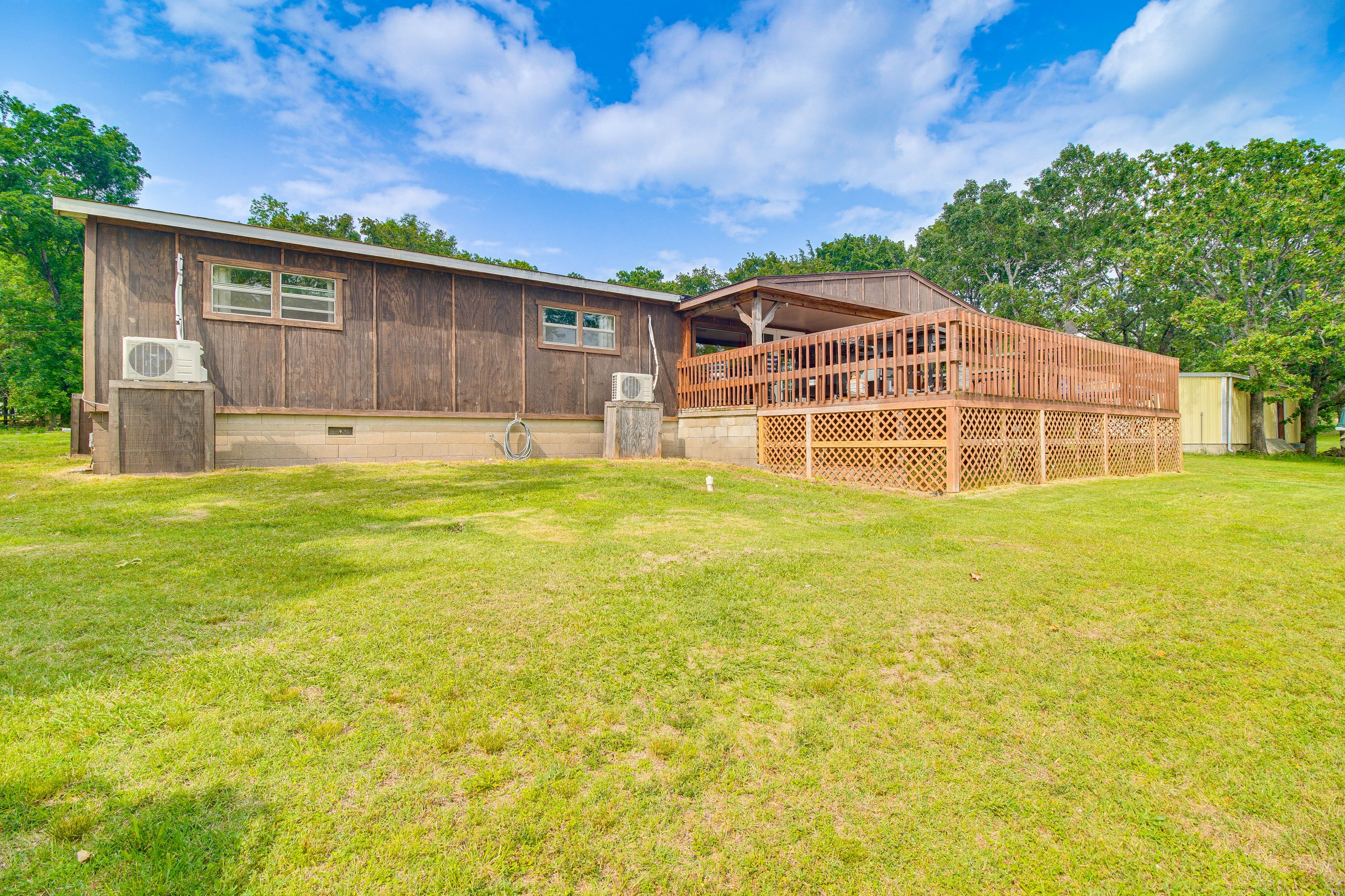 Cabin Exterior | Single-Story Home | Water Views | Private Boat Ramp