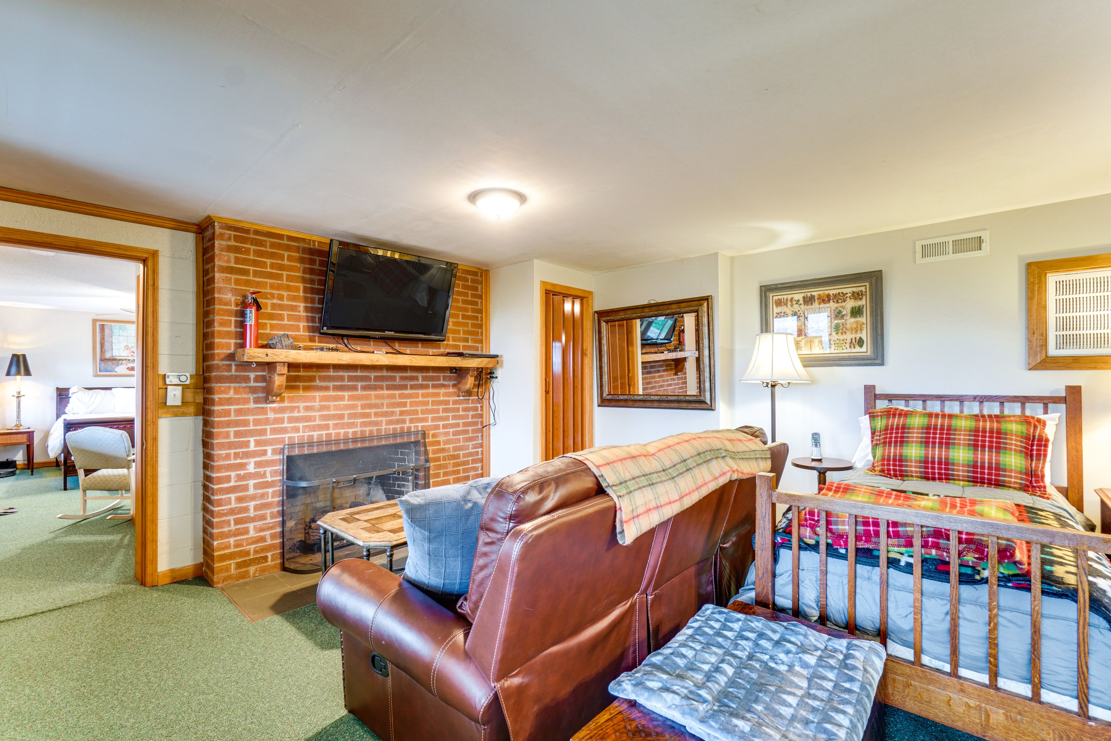 Basement Living Room | 2 Twin Beds | Fireplace