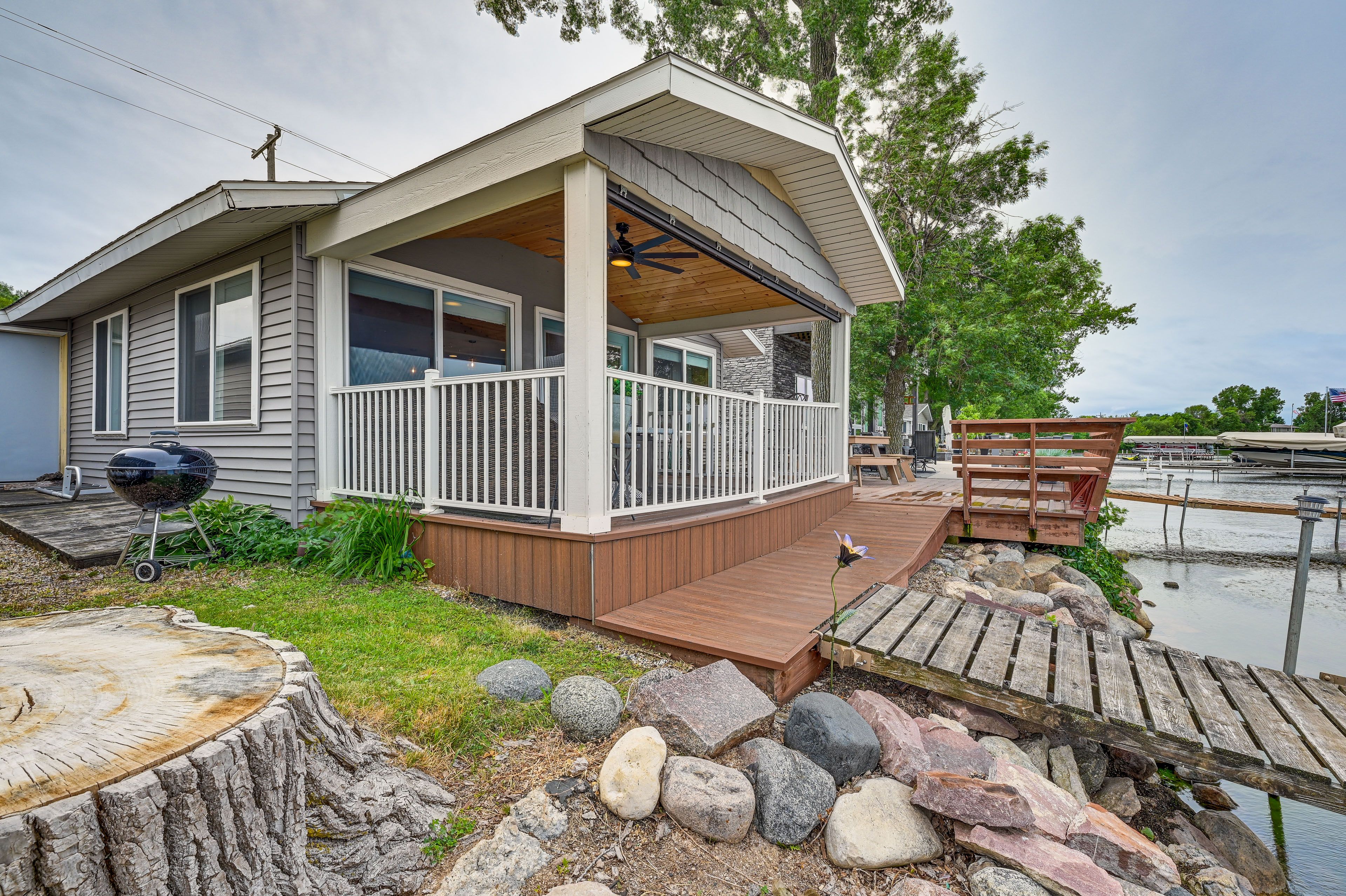 Exterior | Charcoal Grill | Dock (Currently Unavailable) w/ Lake Cornelia Access