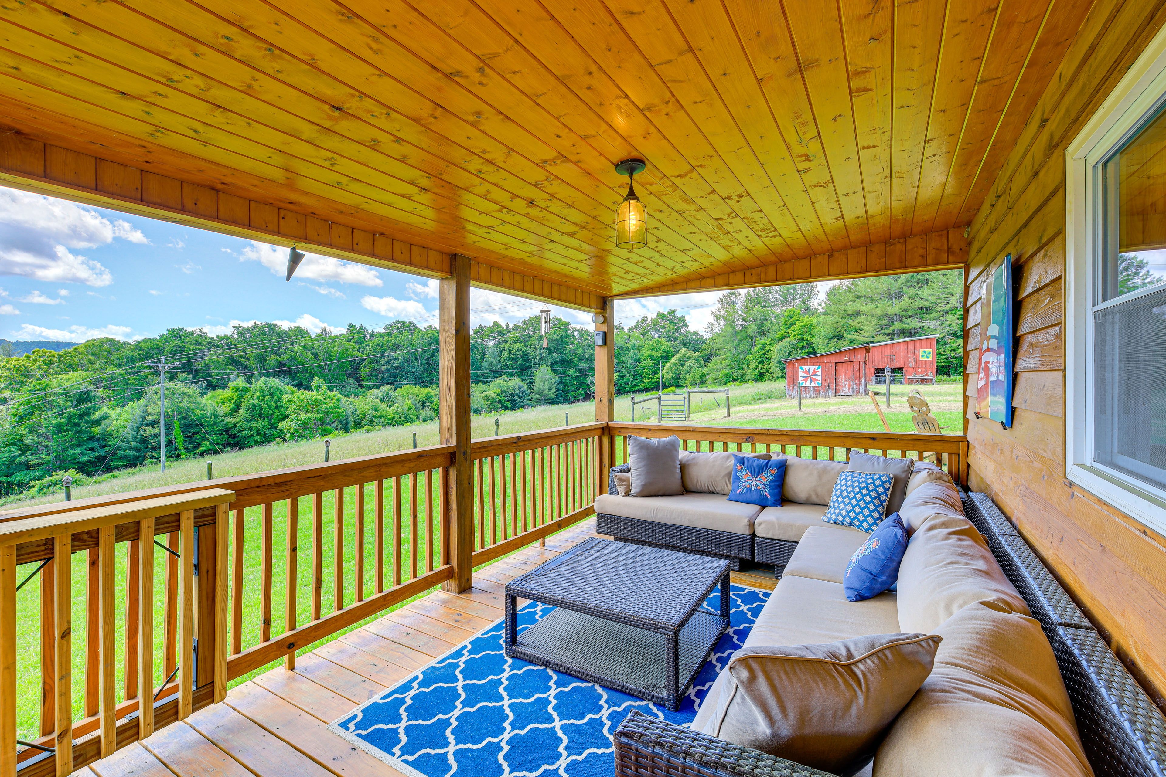Covered Deck | Outdoor Dining Area | Lounge Seating | Pasture Views
