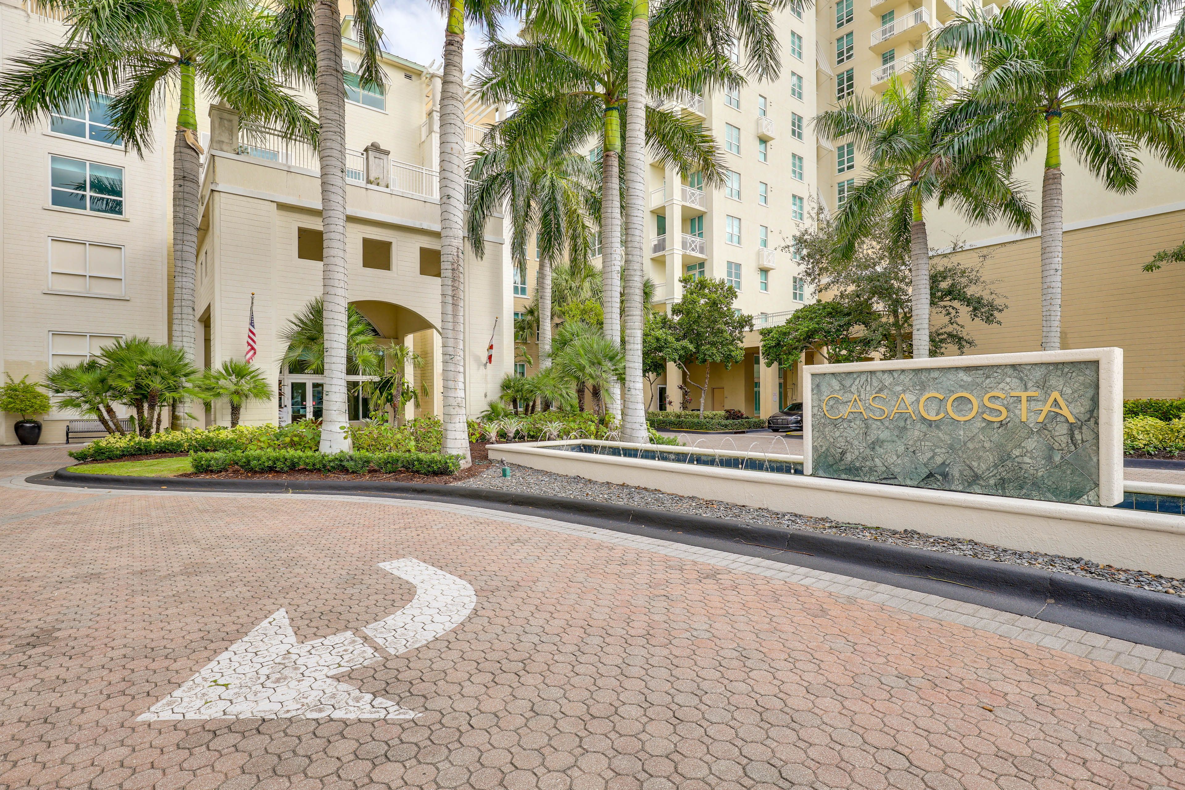 Building Exterior | Assigned Garage Parking (1 Vehicle)