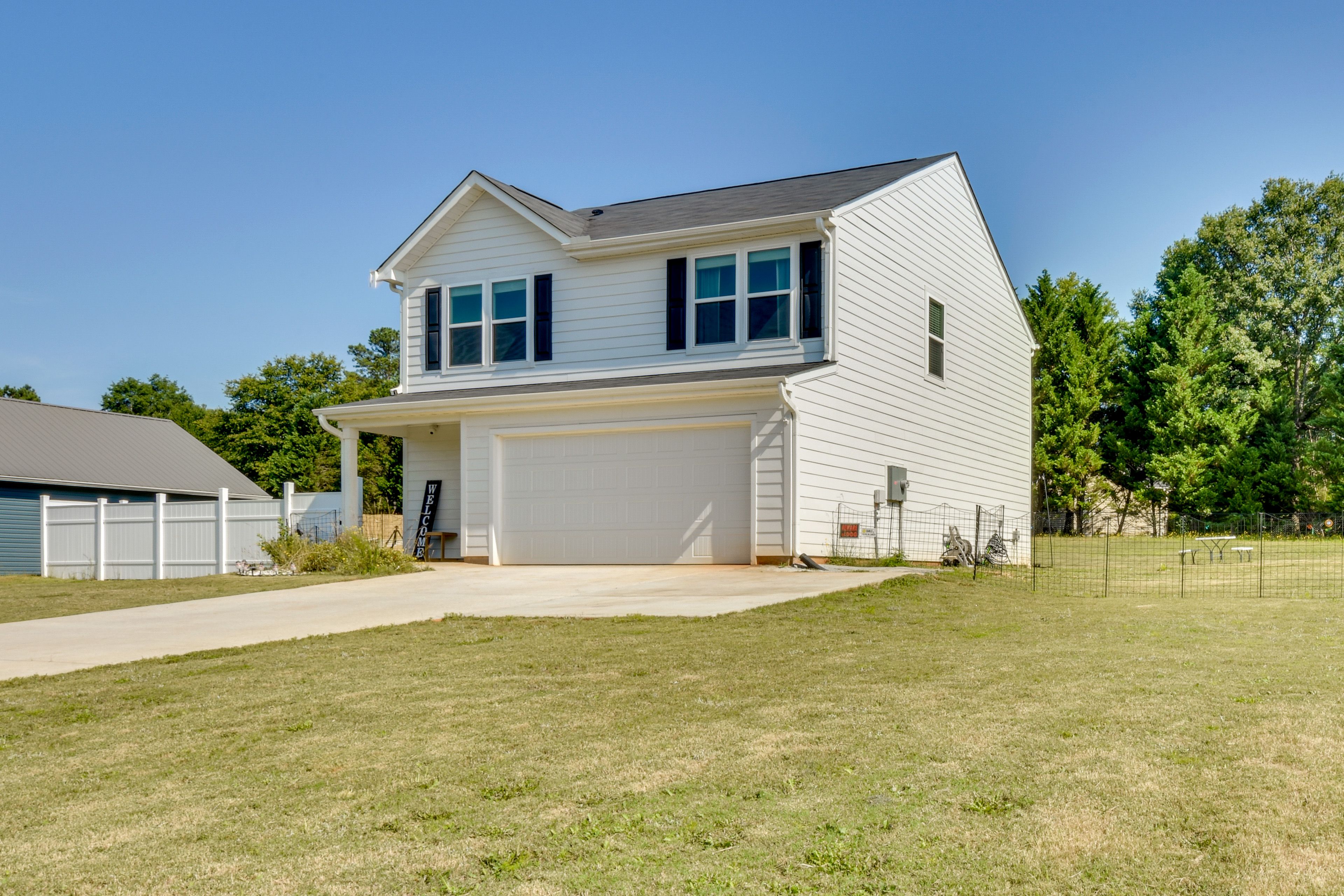 House Exterior | Driveway (4 Vehicles) | RV Parking Allowed