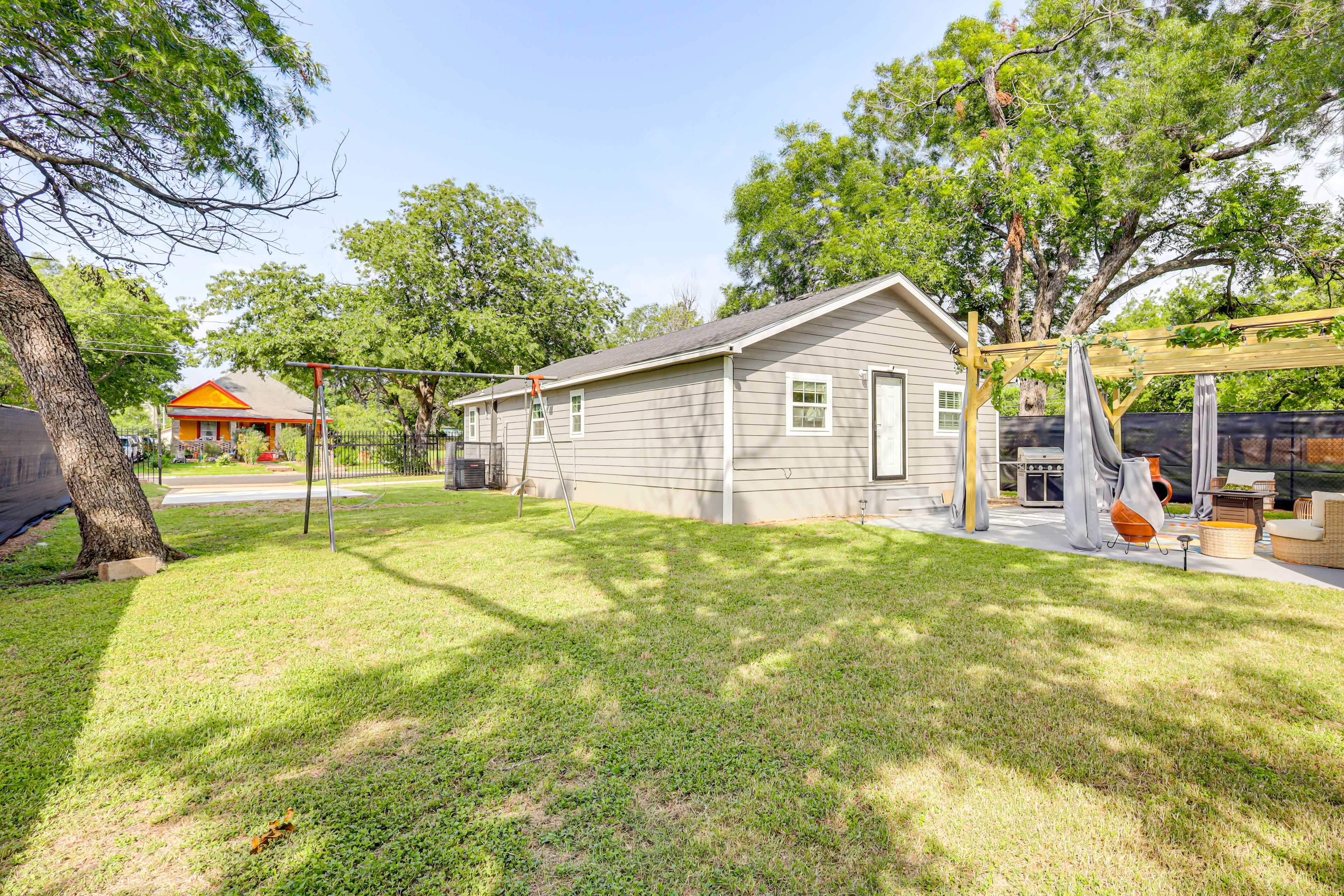 Partially Fenced-In Yard | Swing Set