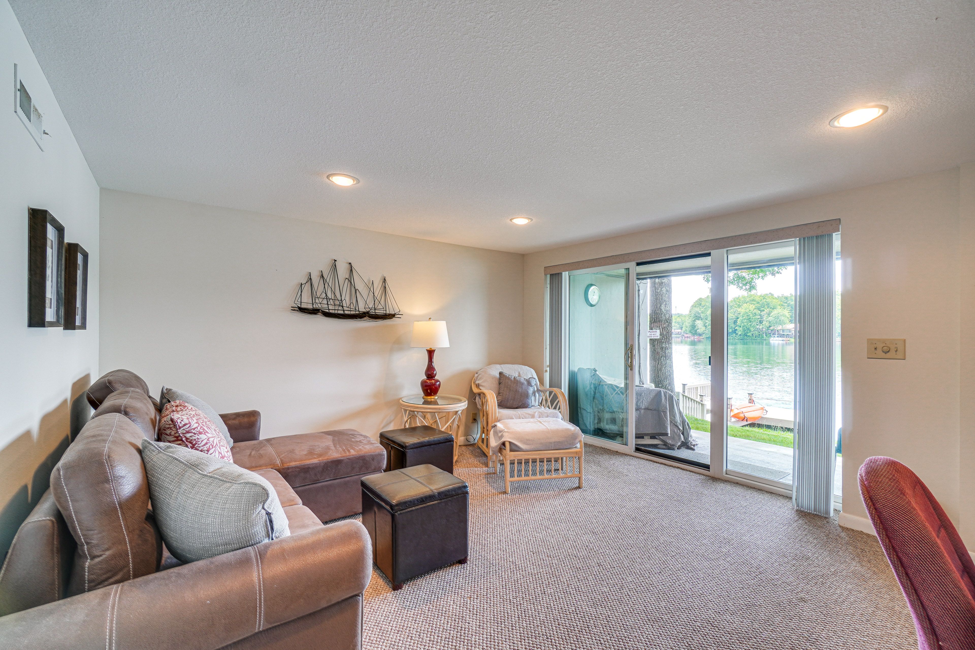 Basement Living Room | Queen Sleeper Sofa | Desk | Patio Access | Basement Level