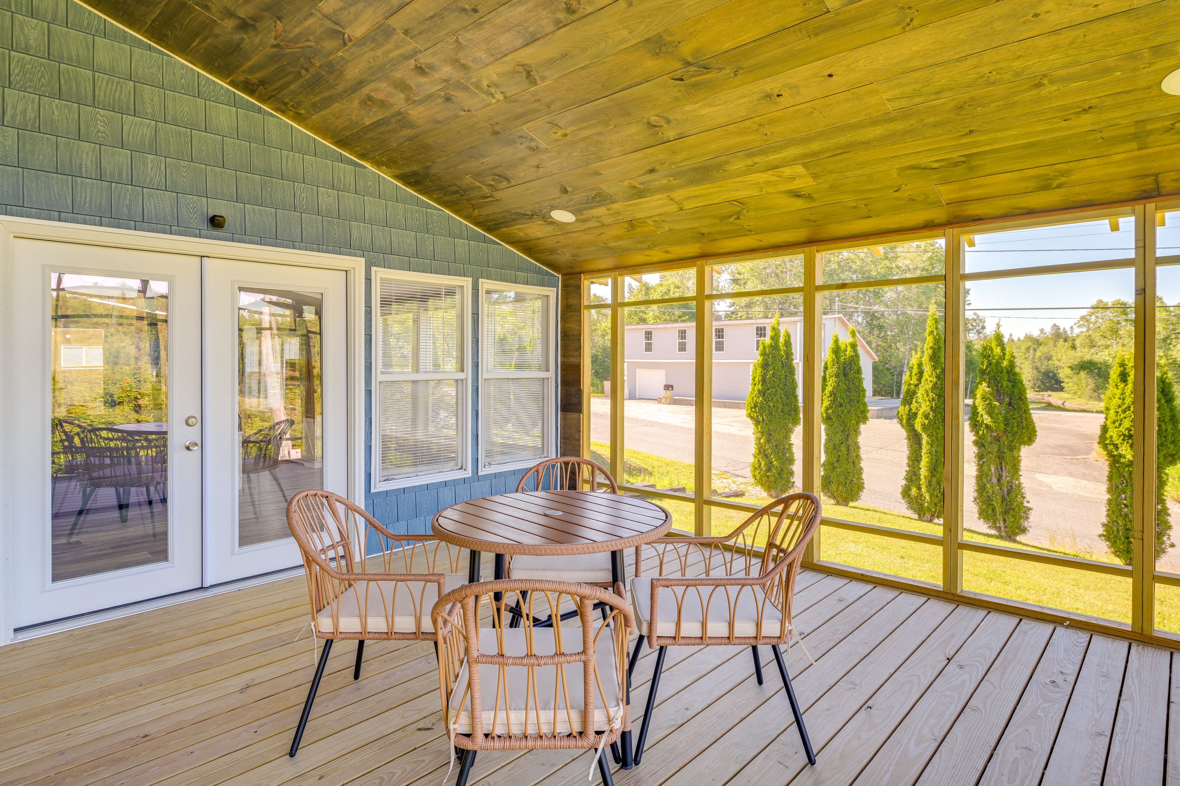 Screened-In Porch | Outdoor Seating & Dining | Bay Views
