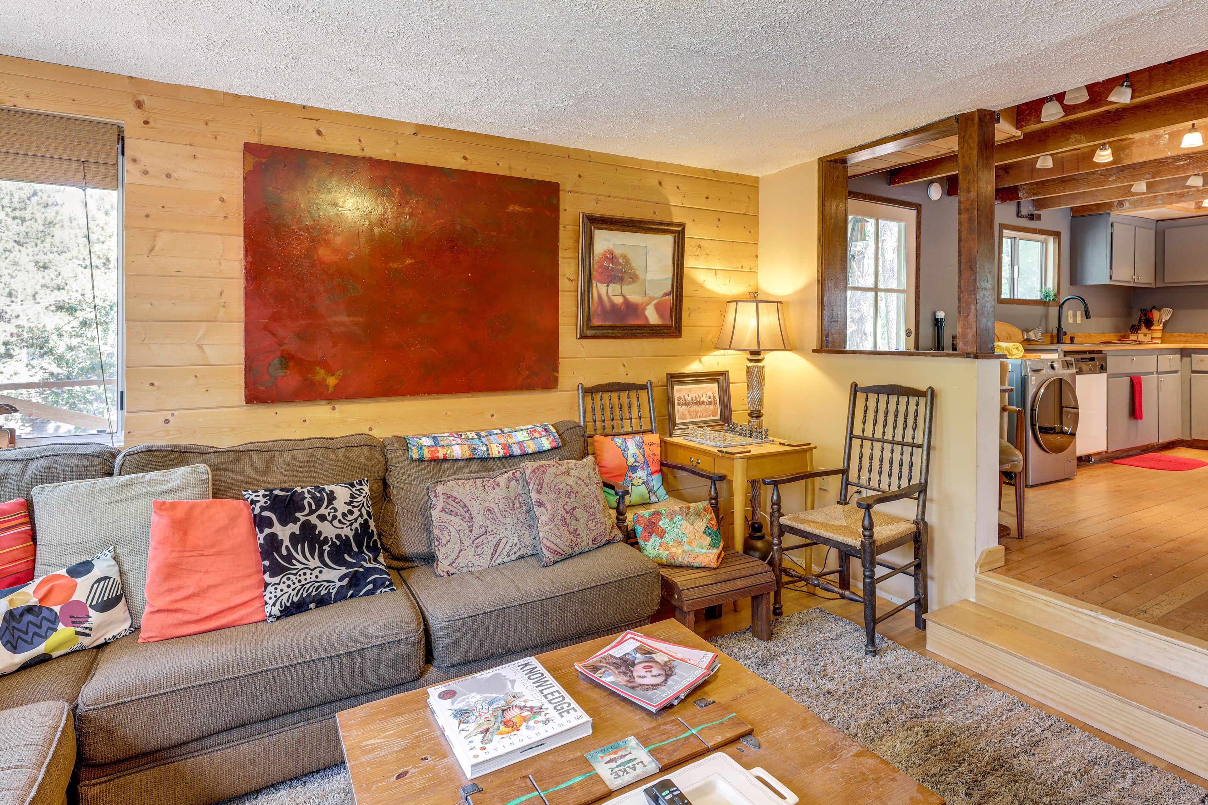 Living Room | 1st Floor | Flat-Screen TV | Wood-Burning Fireplace | Books