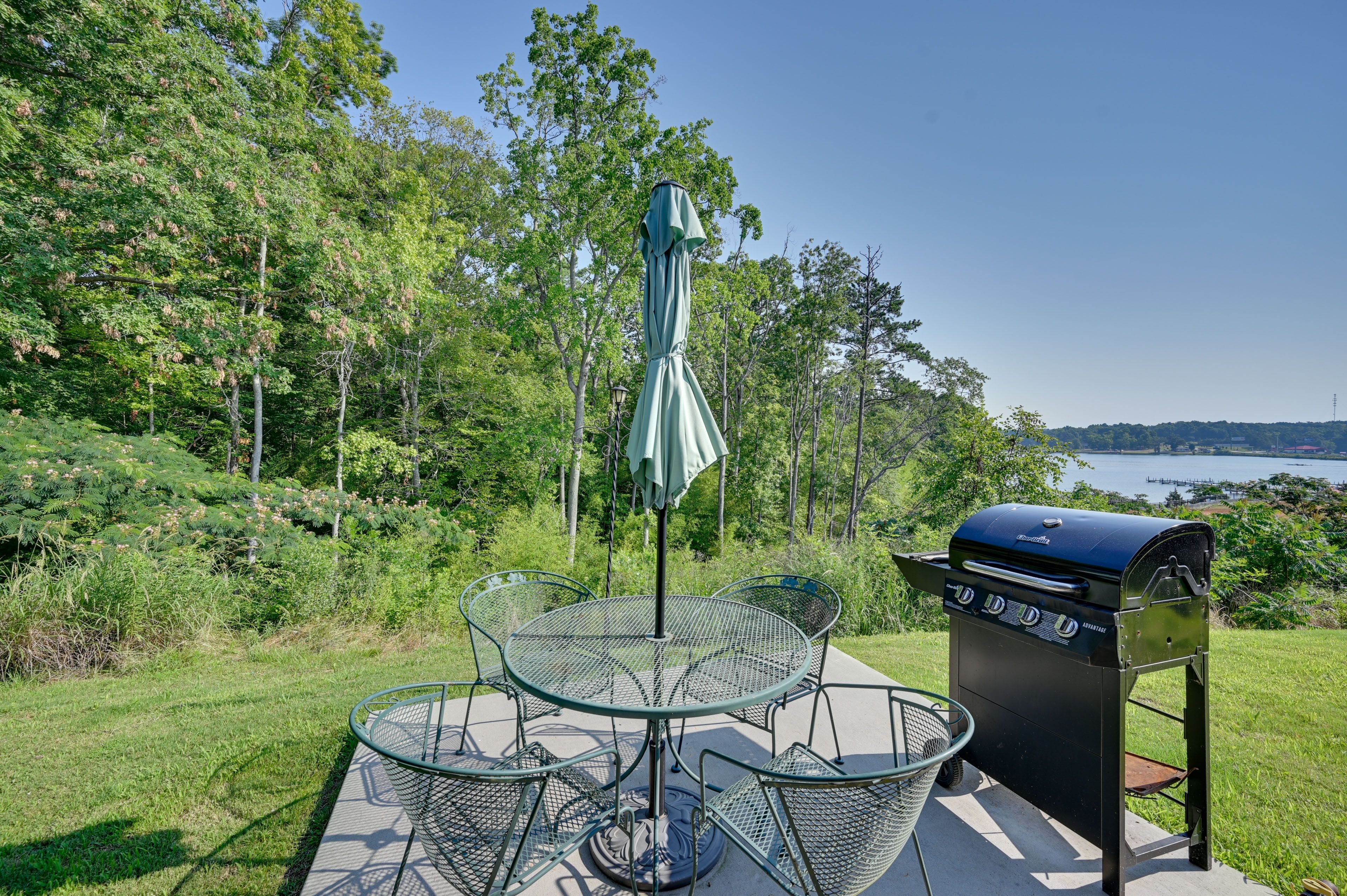 Private Patio | Gas Grill | On-Site Lake Access