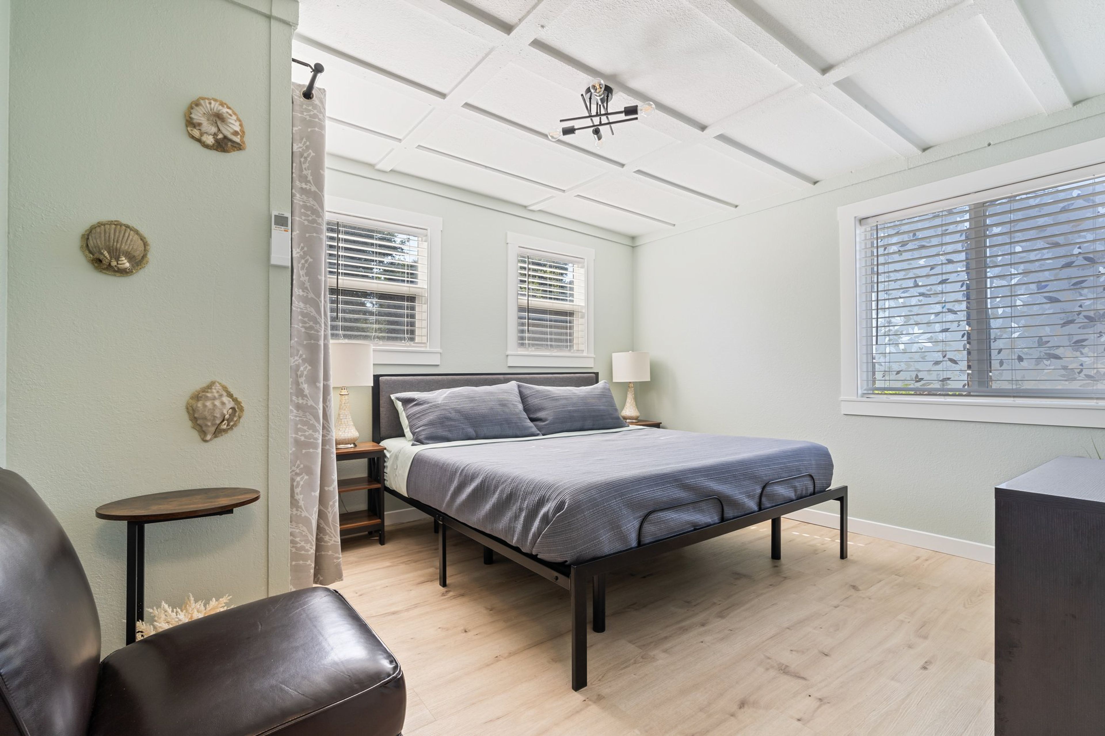 Bedroom 1 | King Bed | Smart TV | A/C Unit | Linens Provided