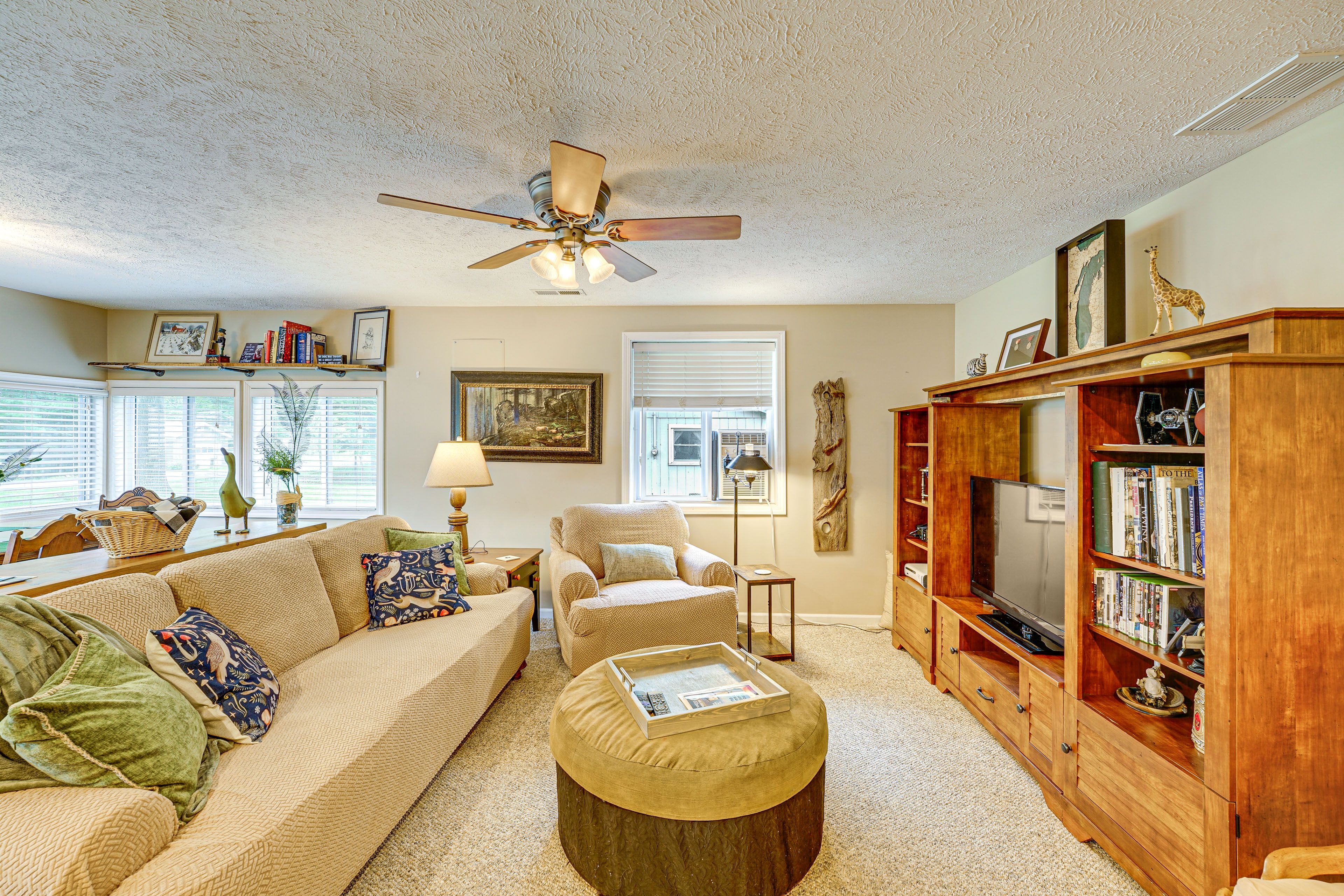 Living Room | Single-Story Home | Window A/C Unit & Central Heating