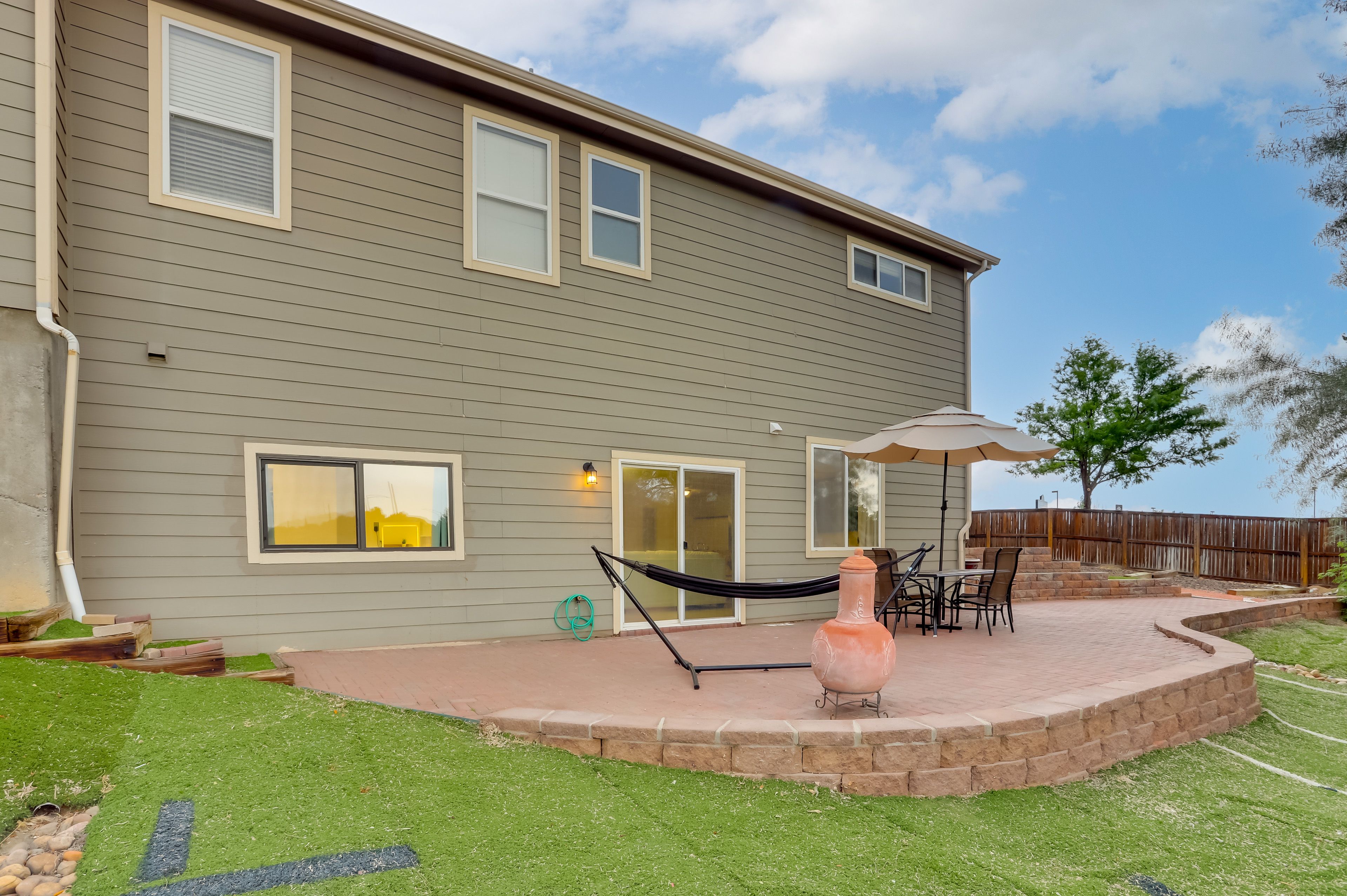 Patio | Outdoor Dining Area | Fenced Yard
