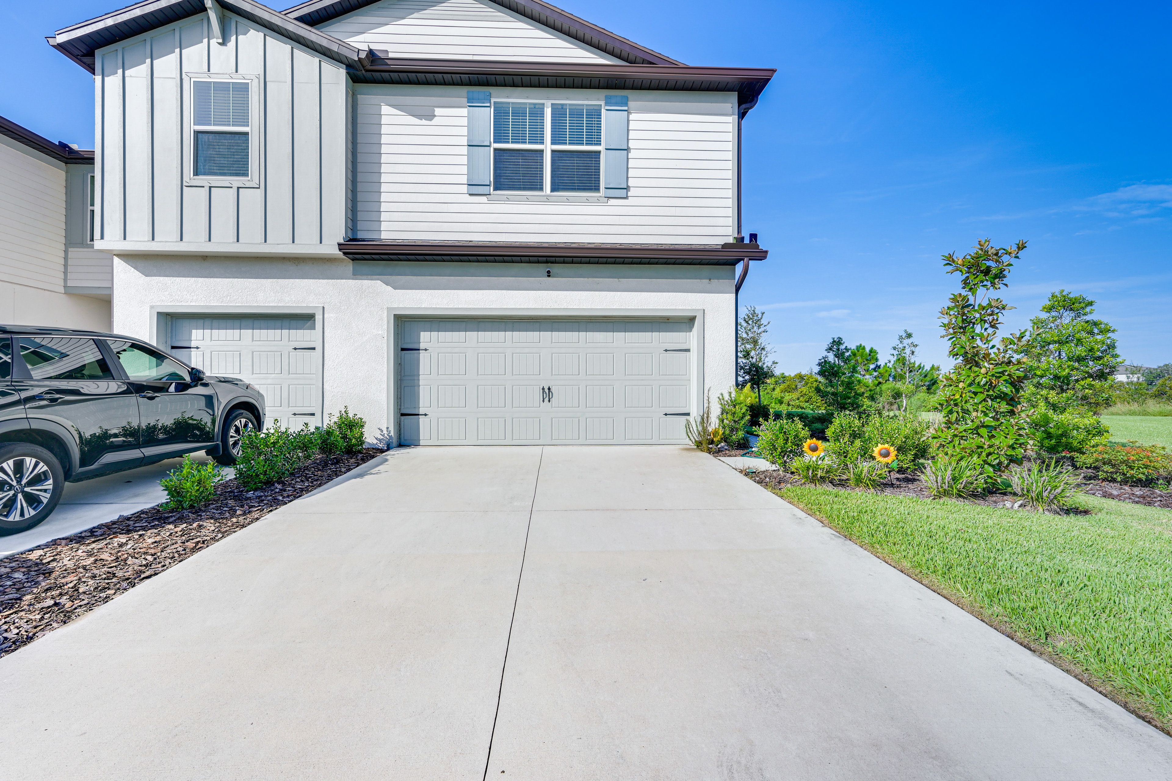 Parking | Driveway (2 Vehicles) | Community Lot (First-Come, First-Served)