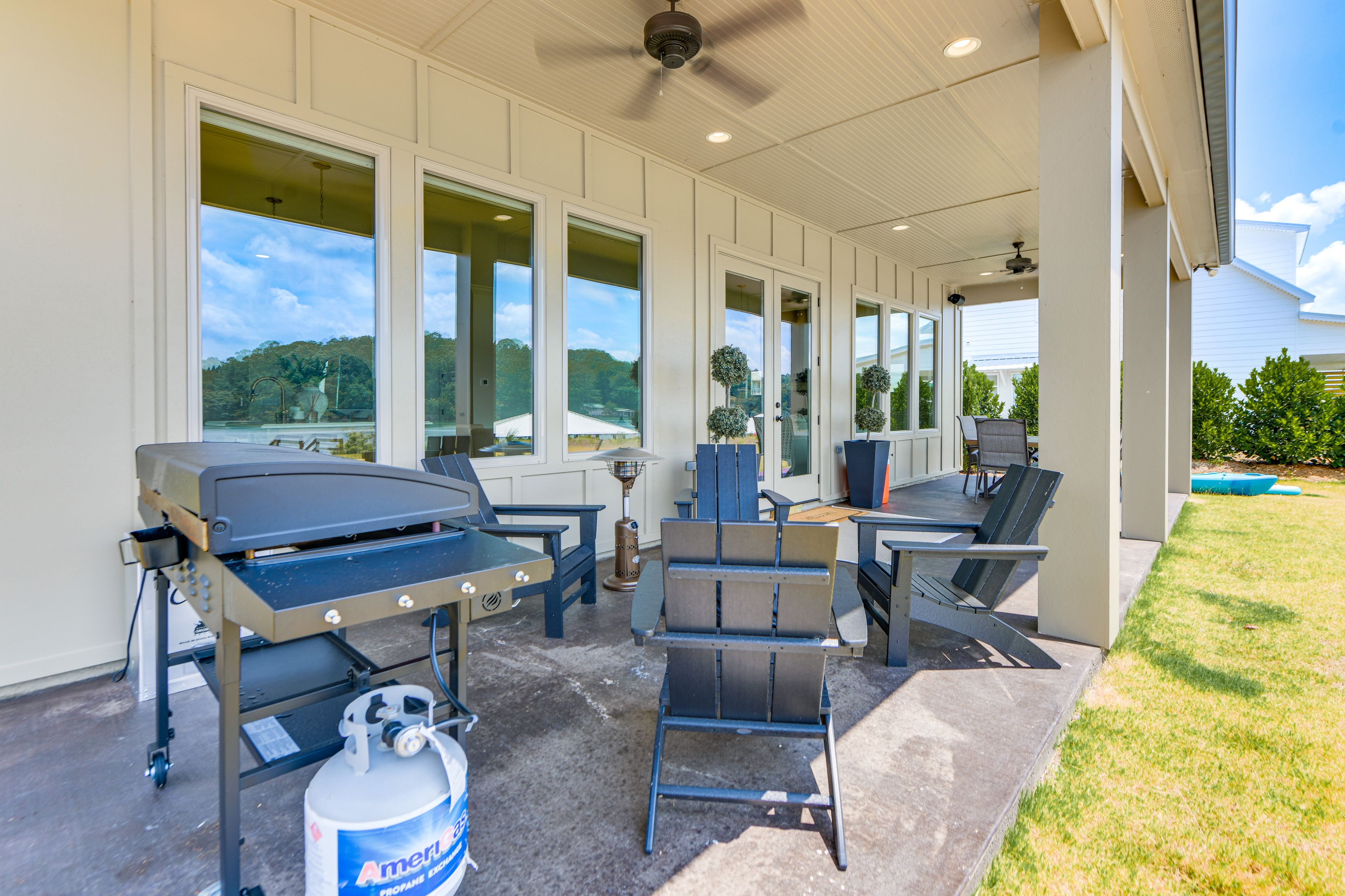 Covered Patio | Outdoor Dining Area | Gas Grill | Lounge Seating | Lake Views