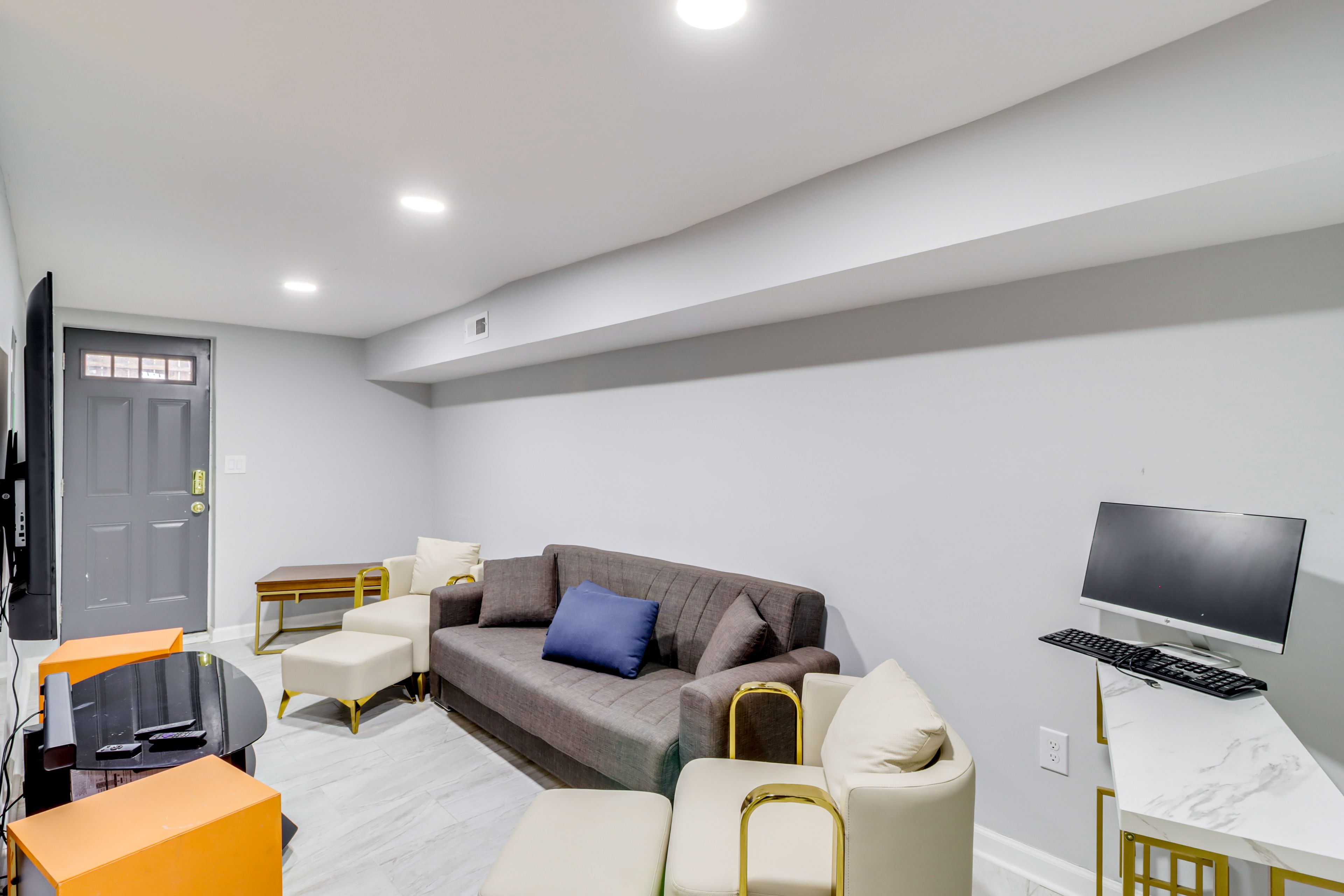 Downstairs Living Room | Lower Level | King Futon | Desk Workspace