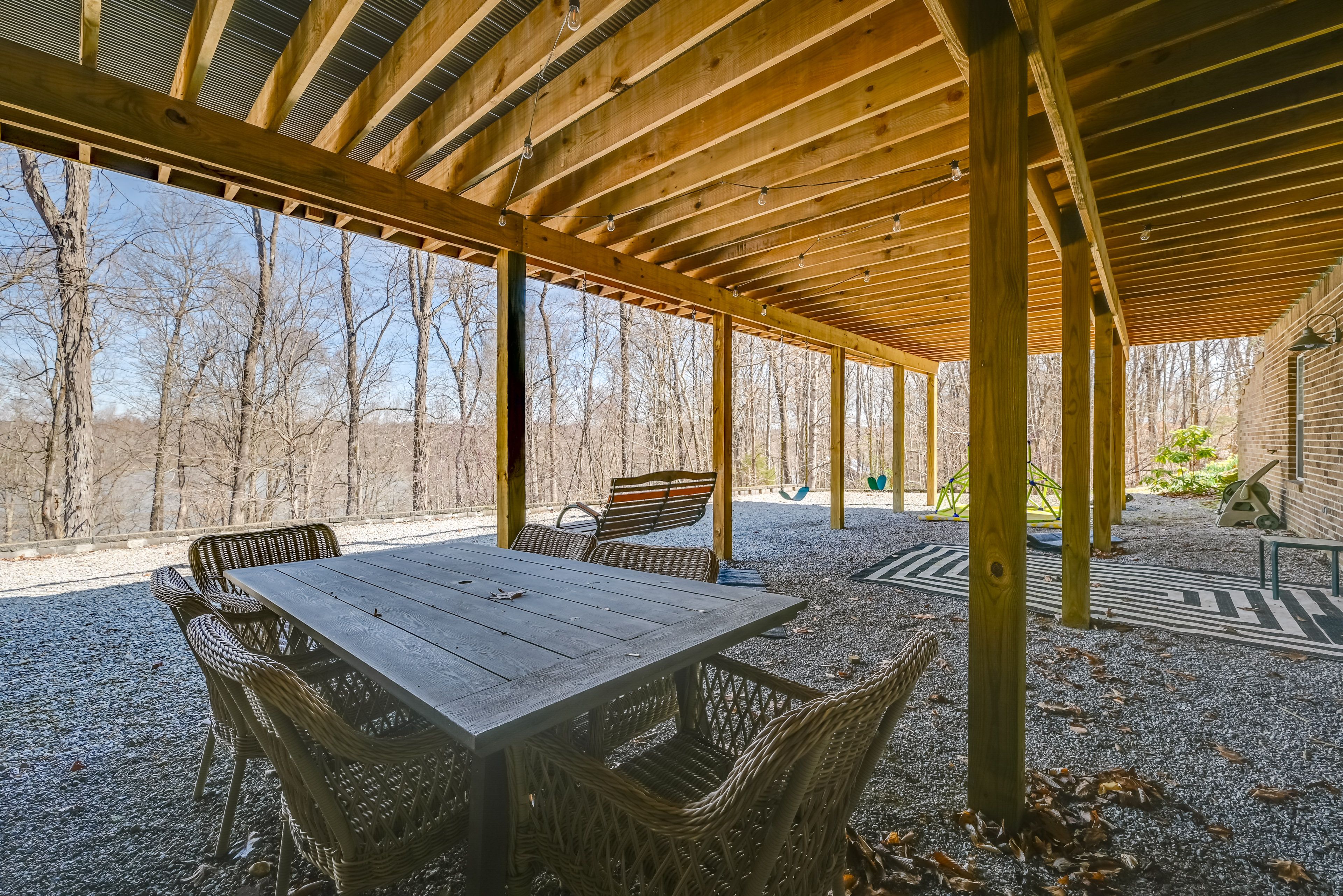 Lower-Level Patio | Additional Outdoor Dining | Swing Seats