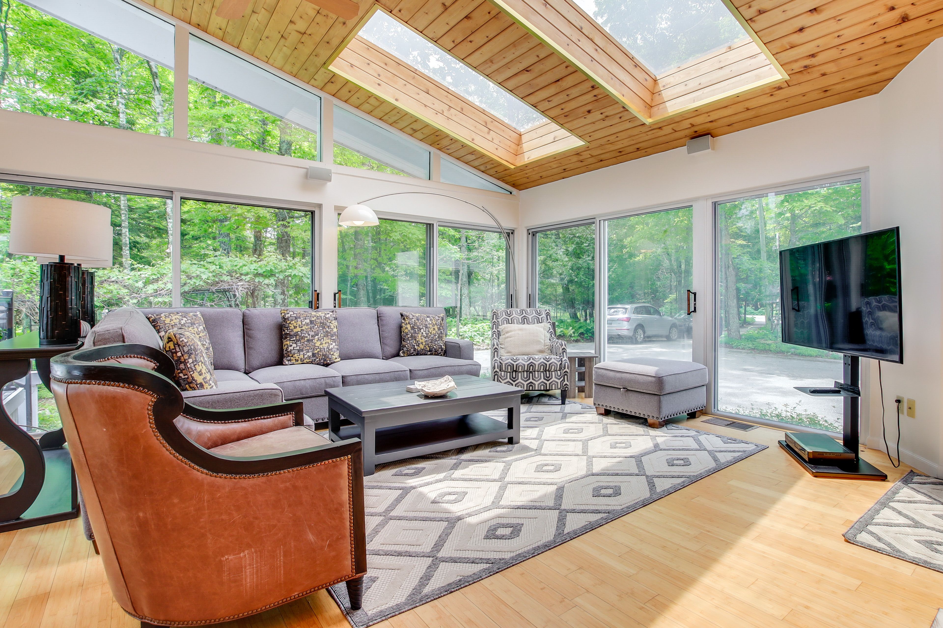 Living Room | Flat-Screen TV | Fireplace | Picture Windows | 1st Floor