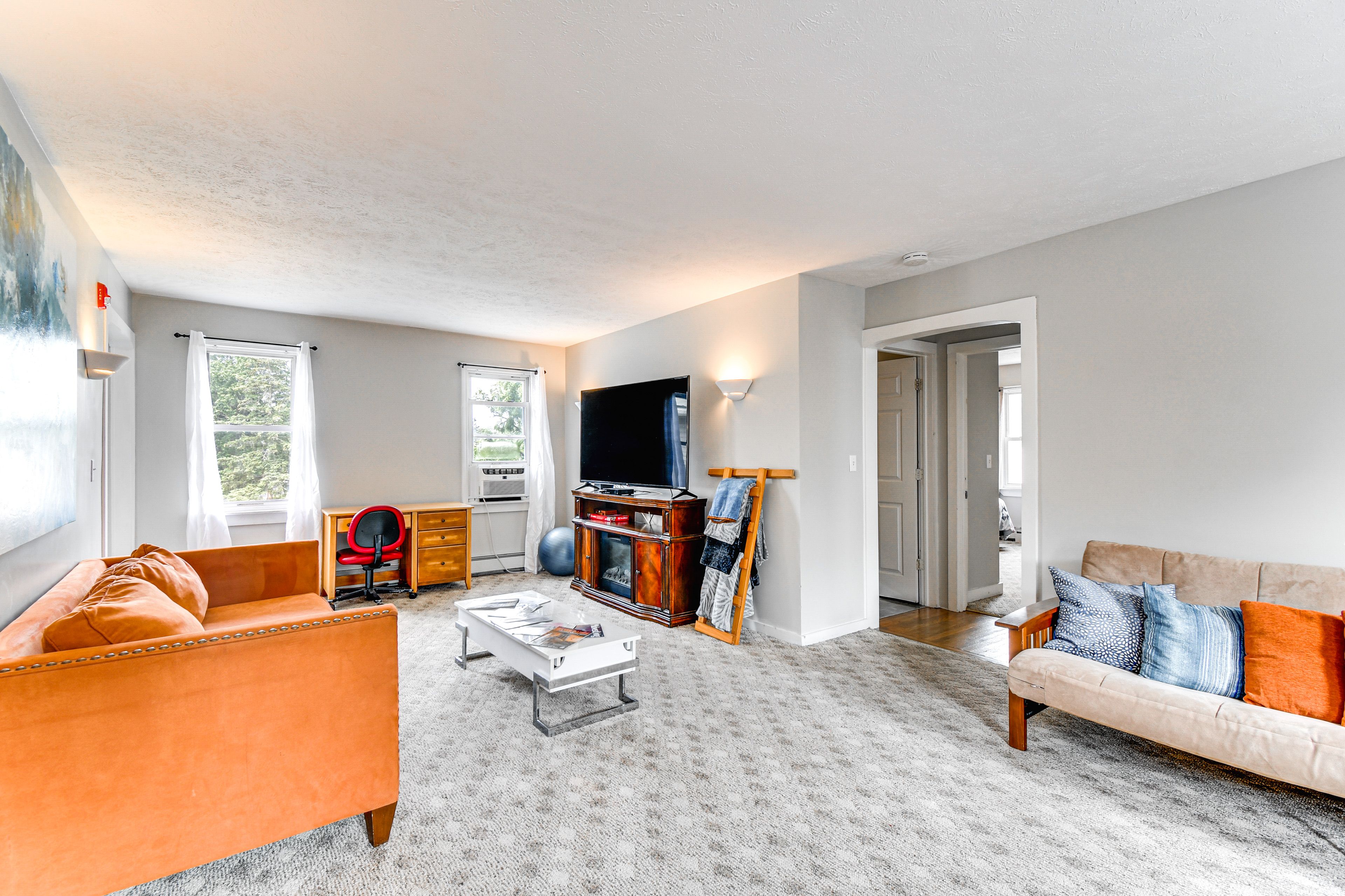 Living Room | Full Futon | Electric Fireplace | Smart TV | Office Space