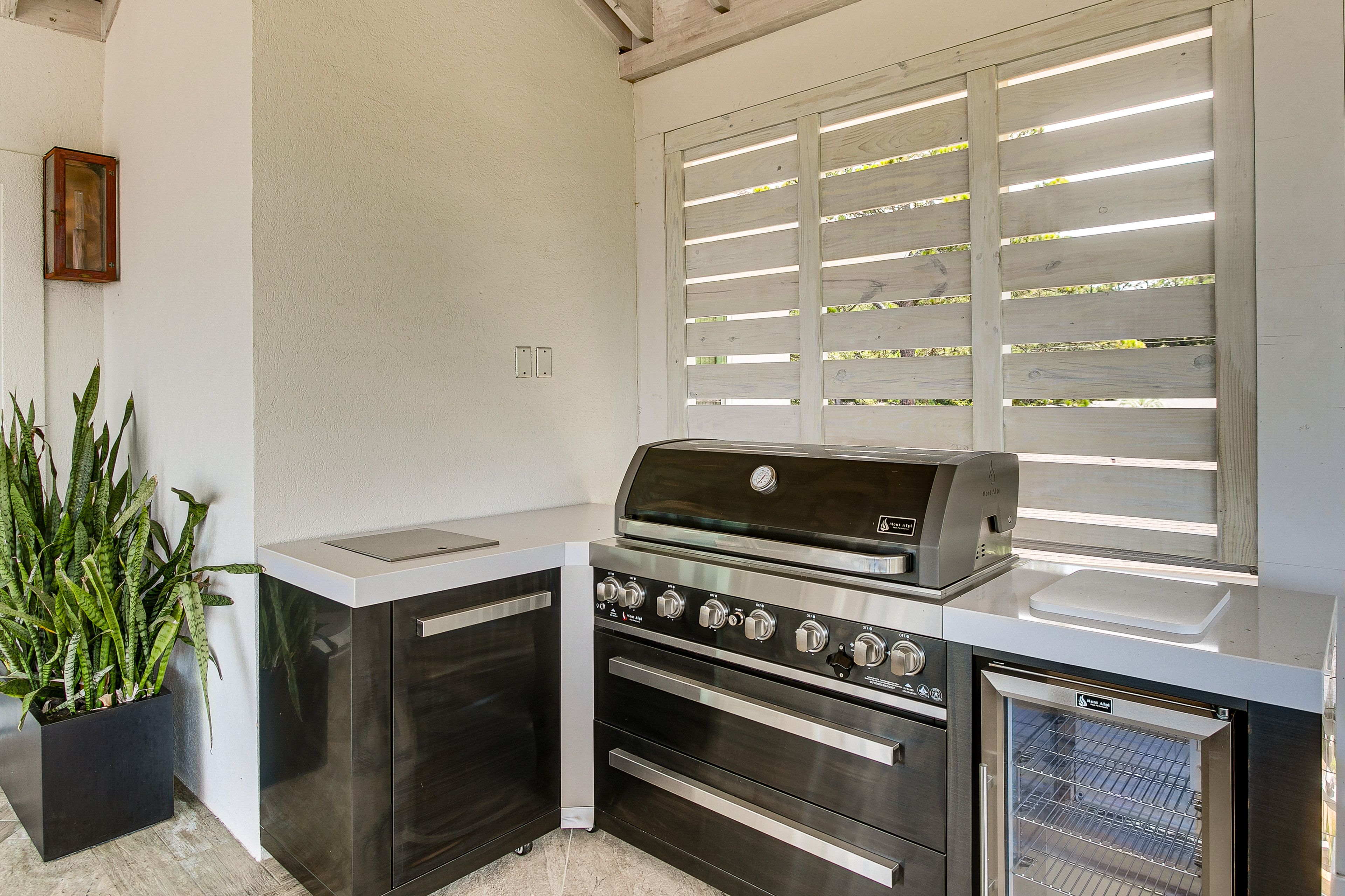 Covered Deck | Built-In Gas Grill & Beverage Fridge | Lounge Area