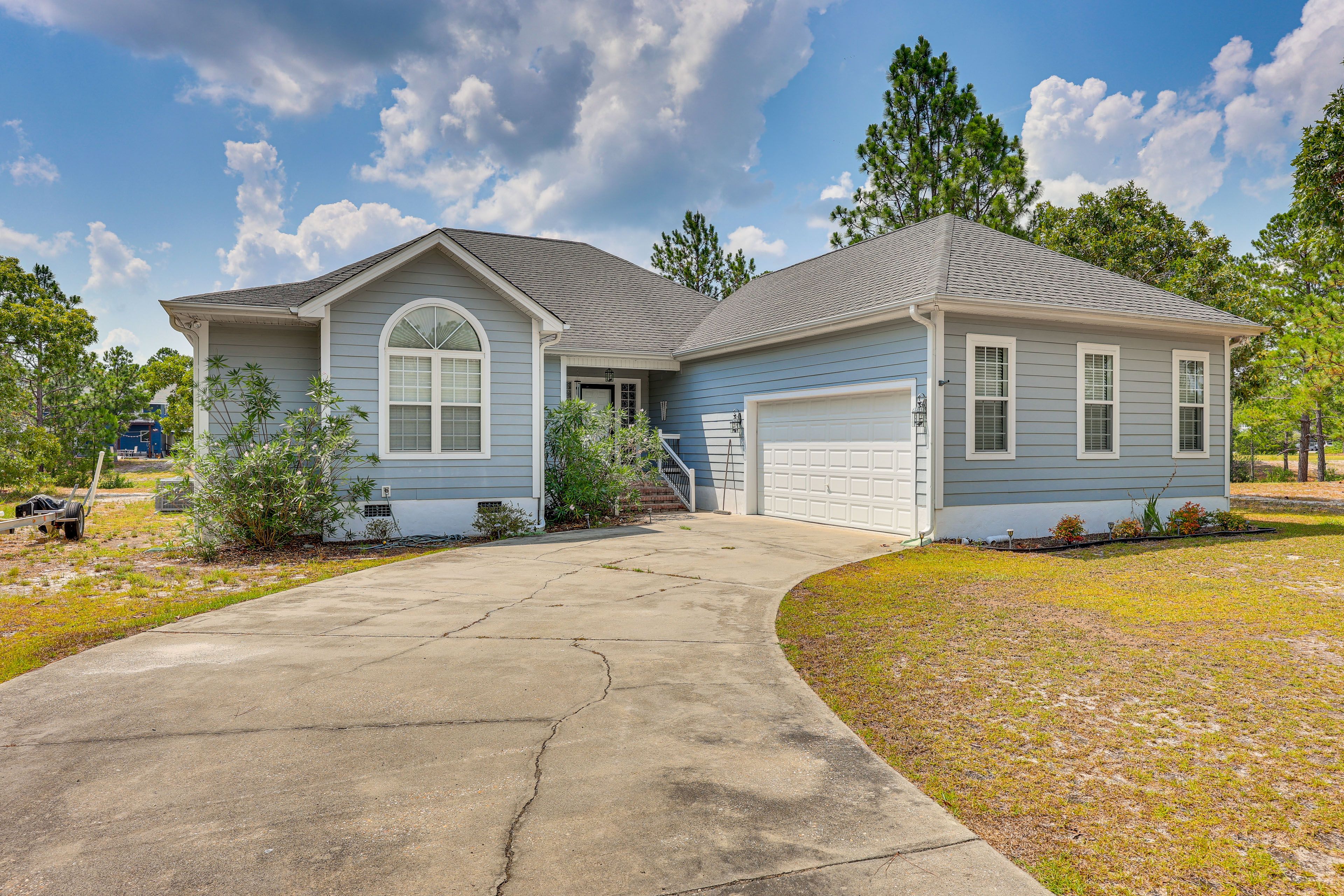 Parking | Driveway (4 Vehicles) | RV/Trailer Parking Allowed On-Site