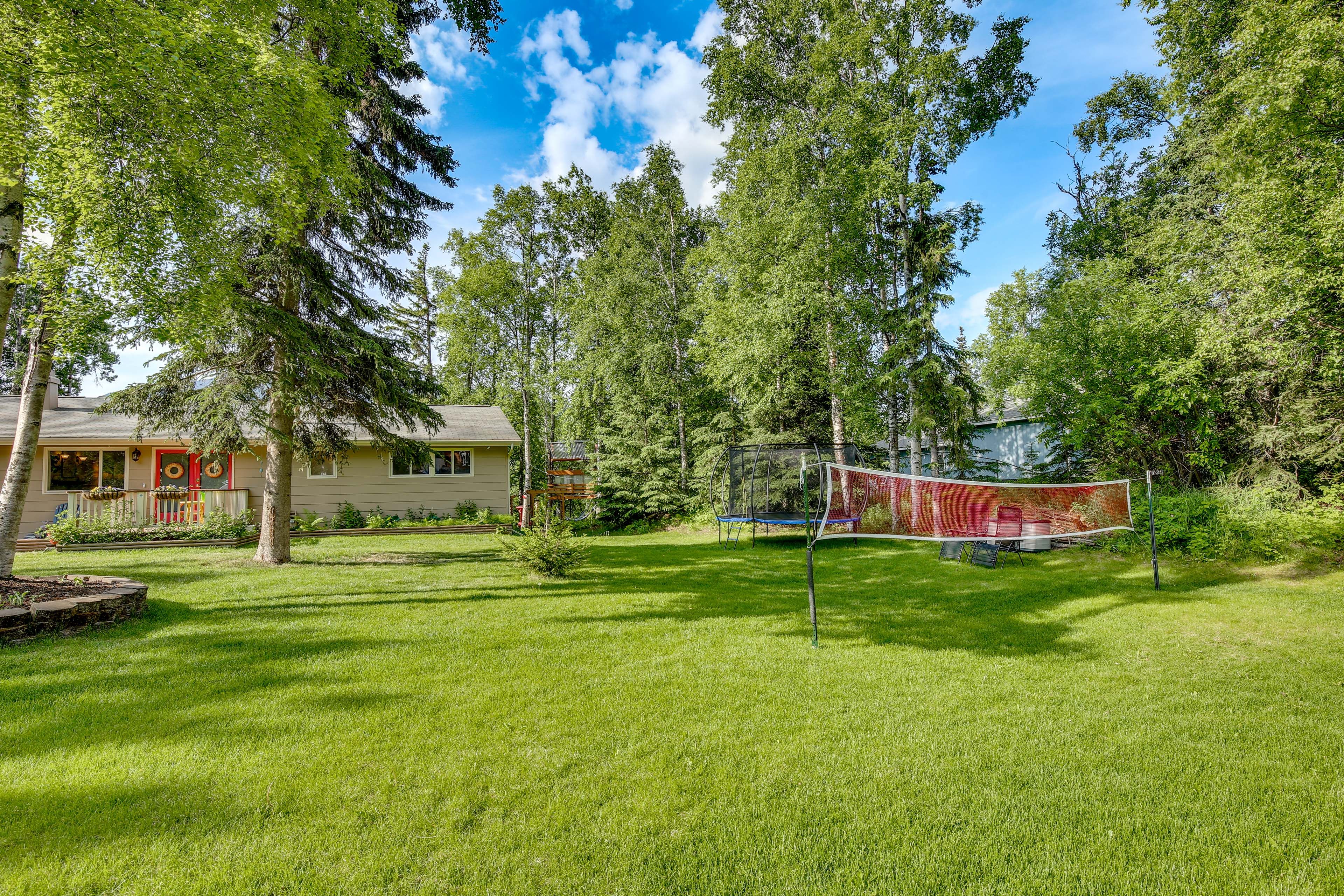 Front Yard | Trampoline | Badminton Net