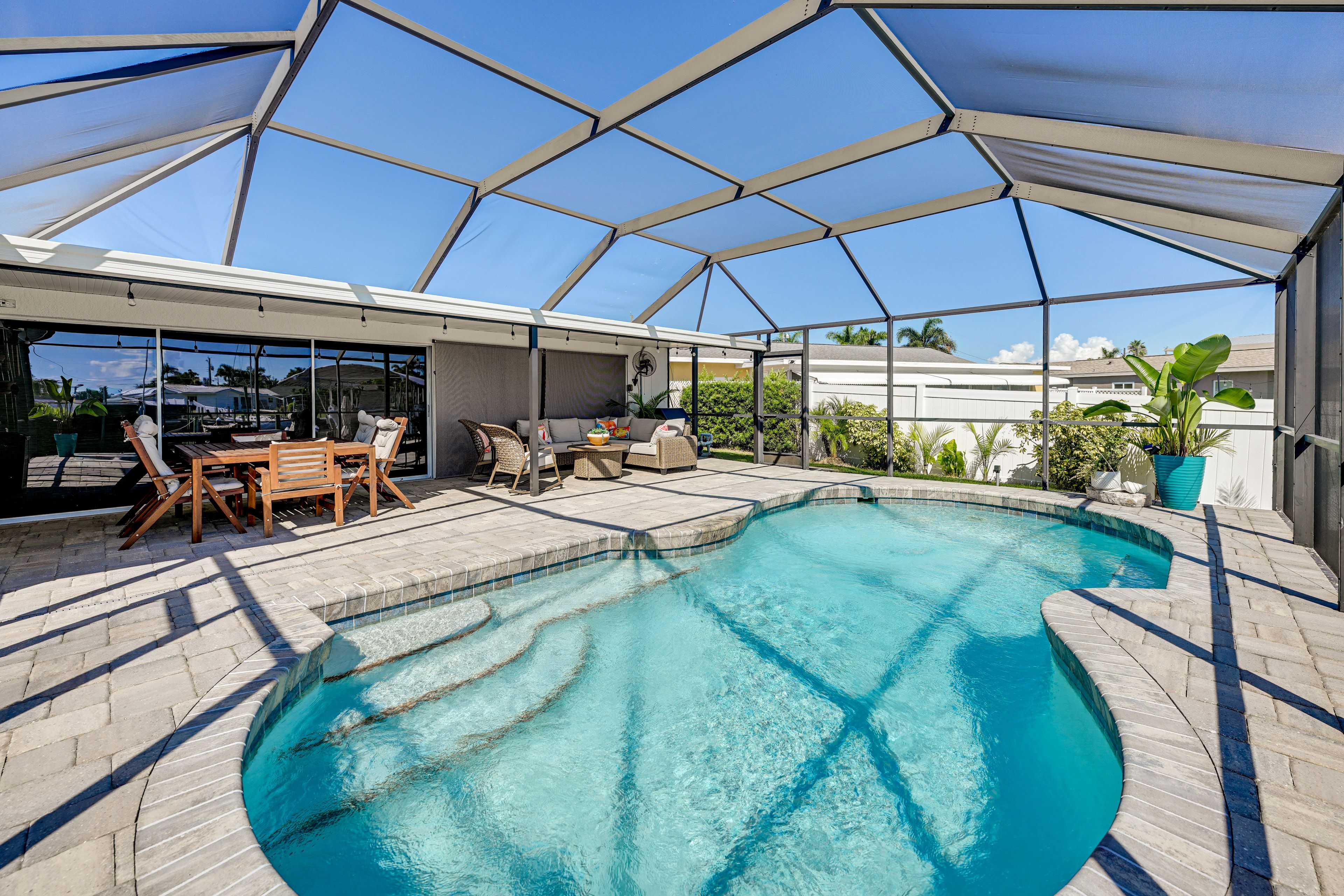 Palmetto Vacation Rental | 3BR | 3BA | 1,450 Sq Ft | Stairs Required