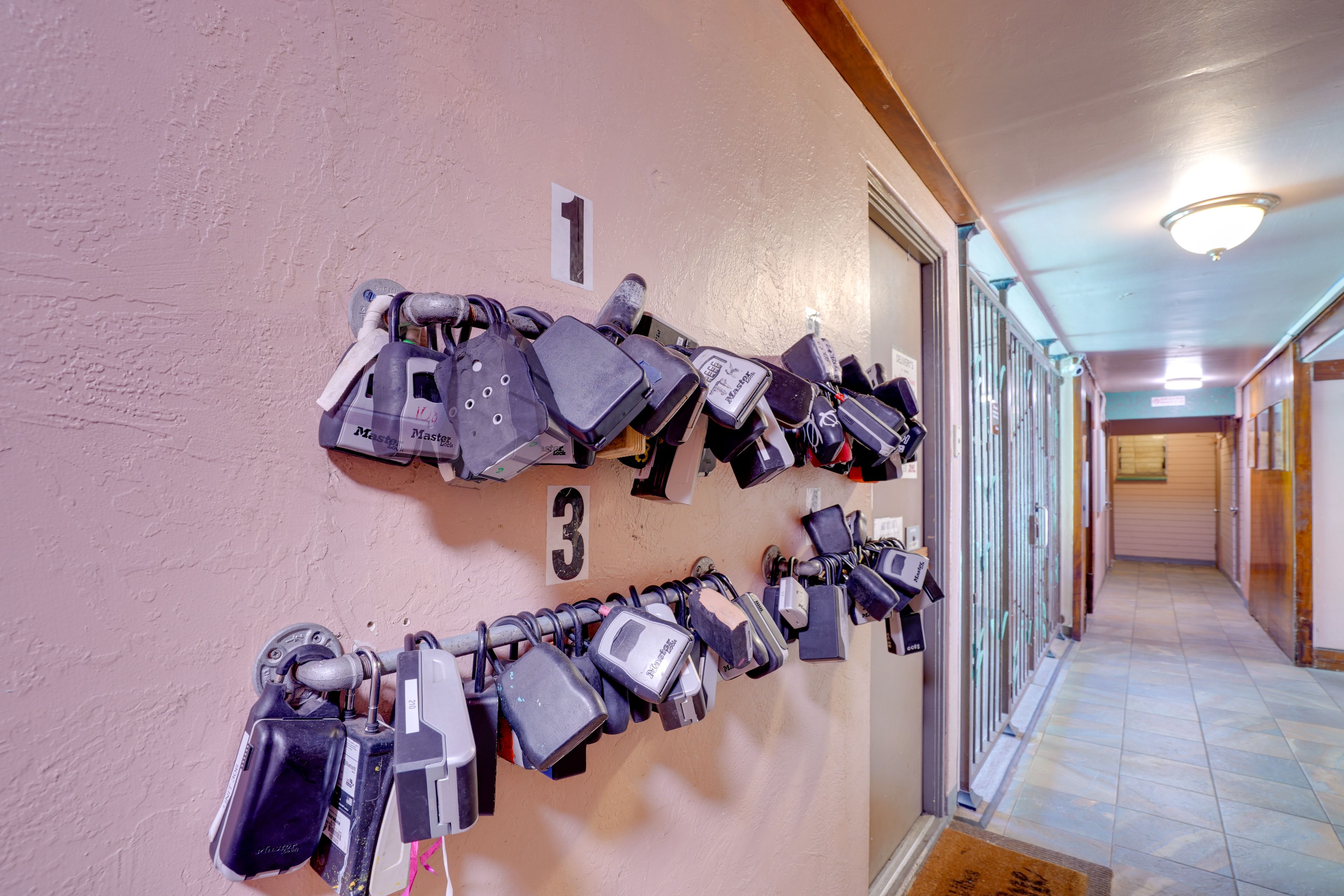 Lockbox Area (Left of Elevator & Exterior Door)