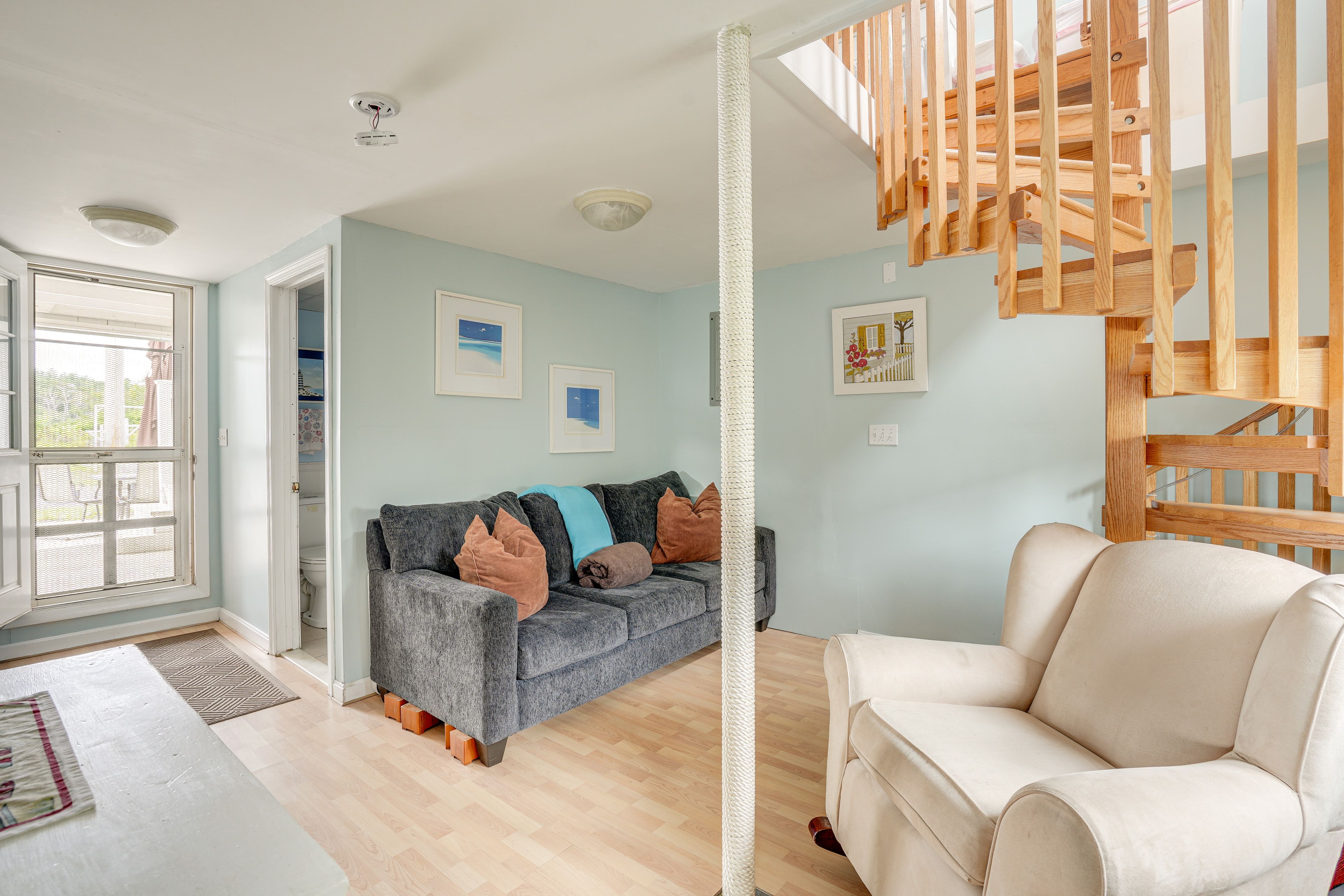 Living Area | Flat-Screen TV | Books | 1st Floor