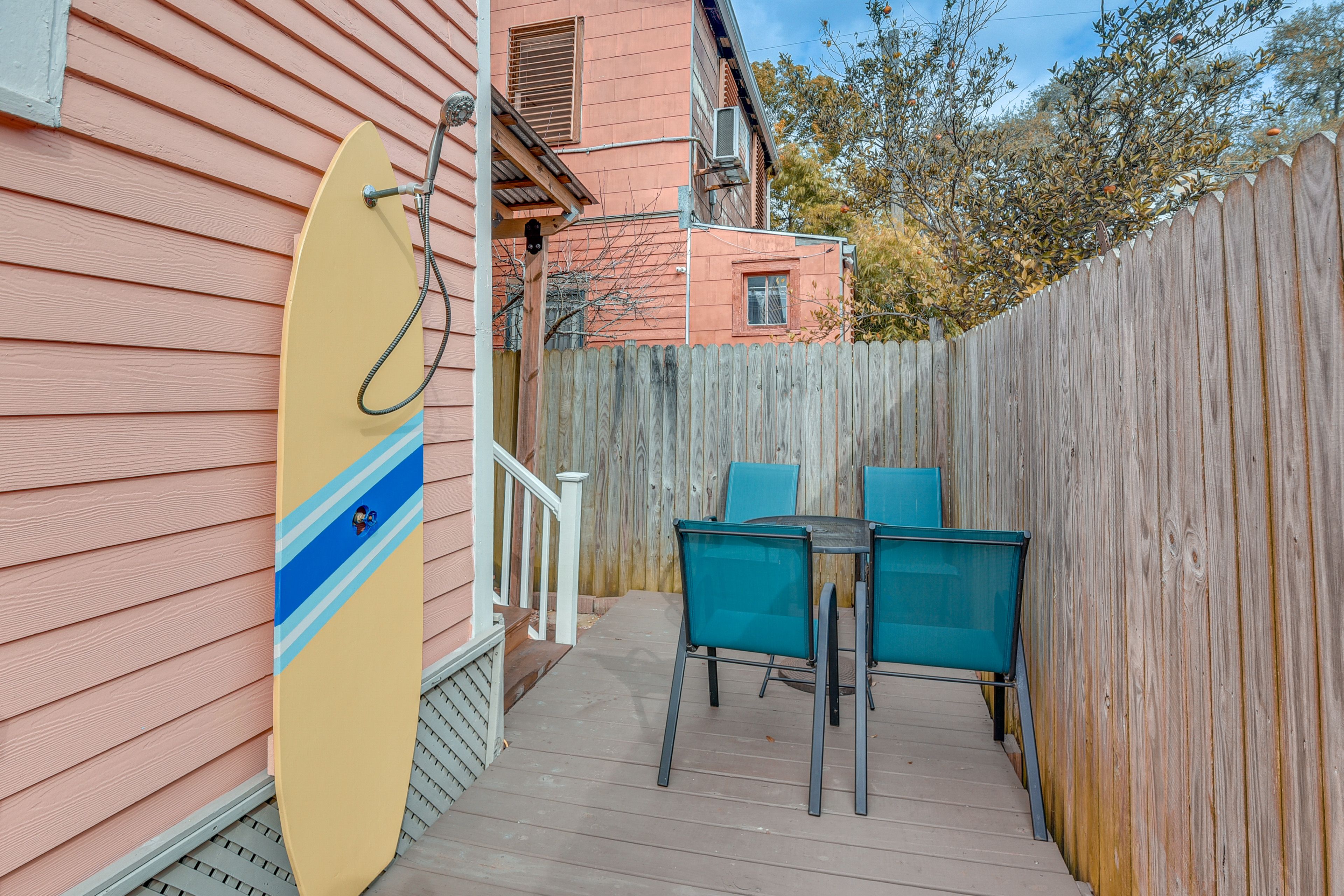 Fenced-In Patio | Outdoor Seating & Dining | Table Umbrella