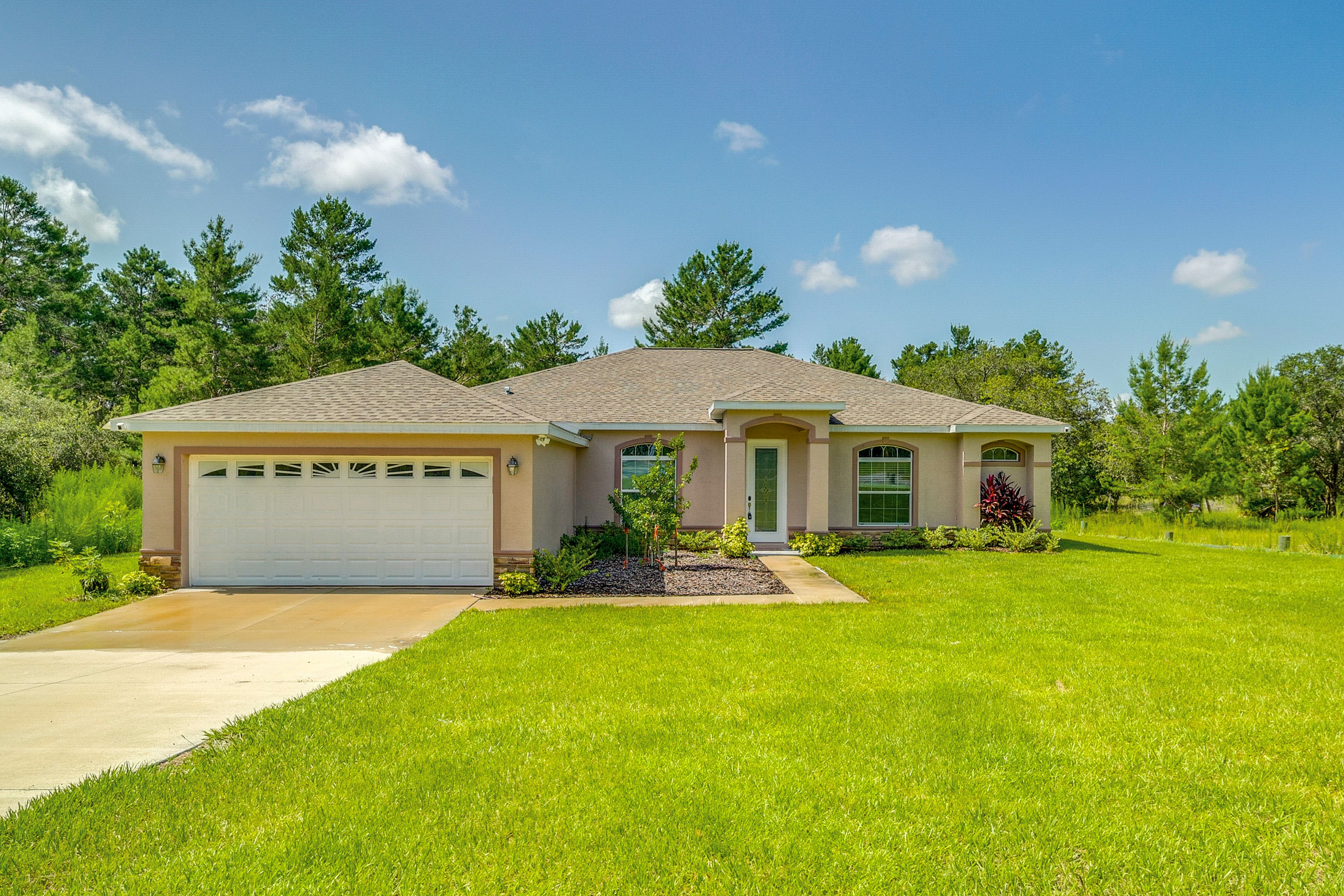 Brooksville Vacation Rental | 4BR | 3BA | 2,138 Sq Ft | Small Step to Enter