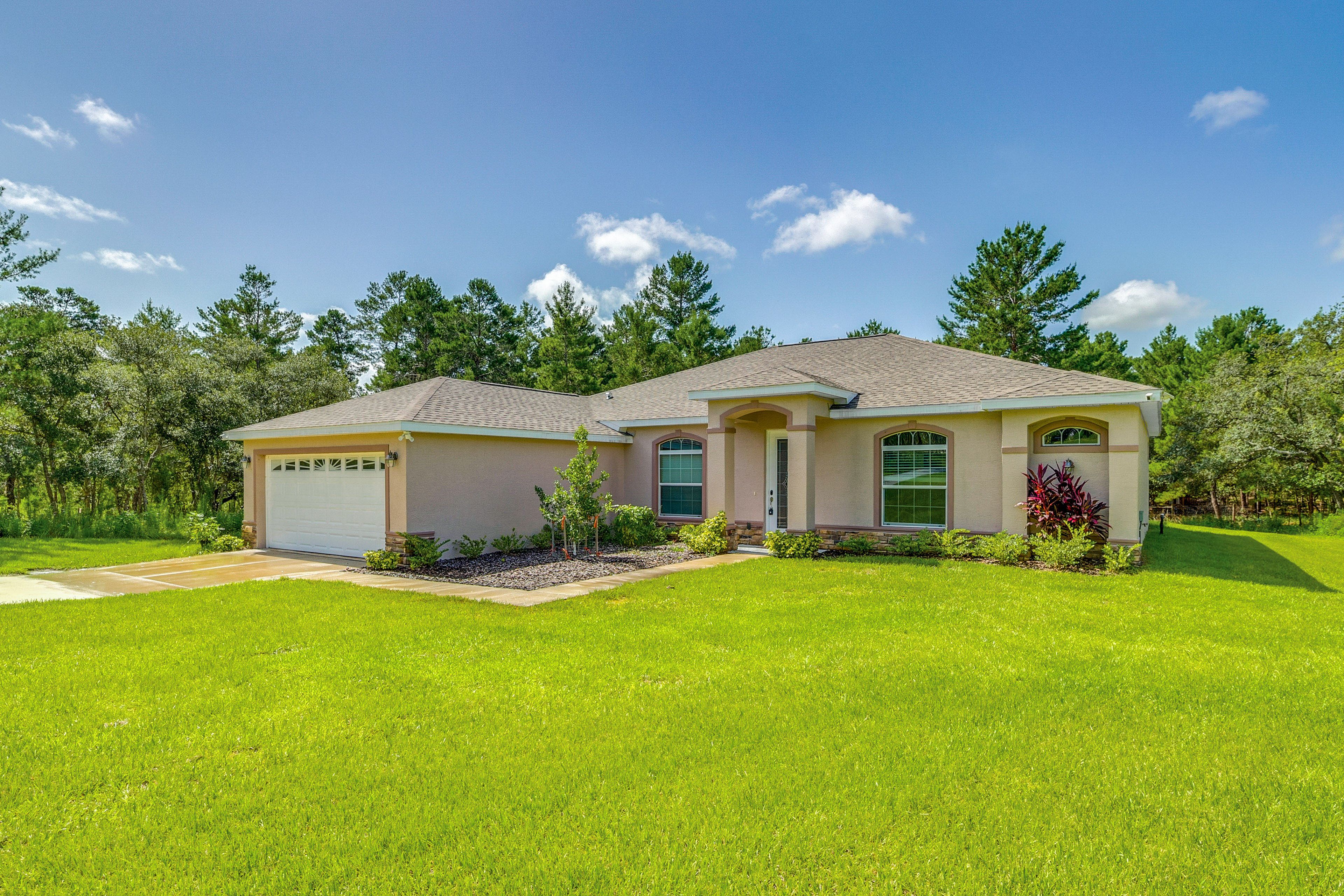Property Exterior | Garage (2 Vehicles) | Driveway (8 Vehicles)