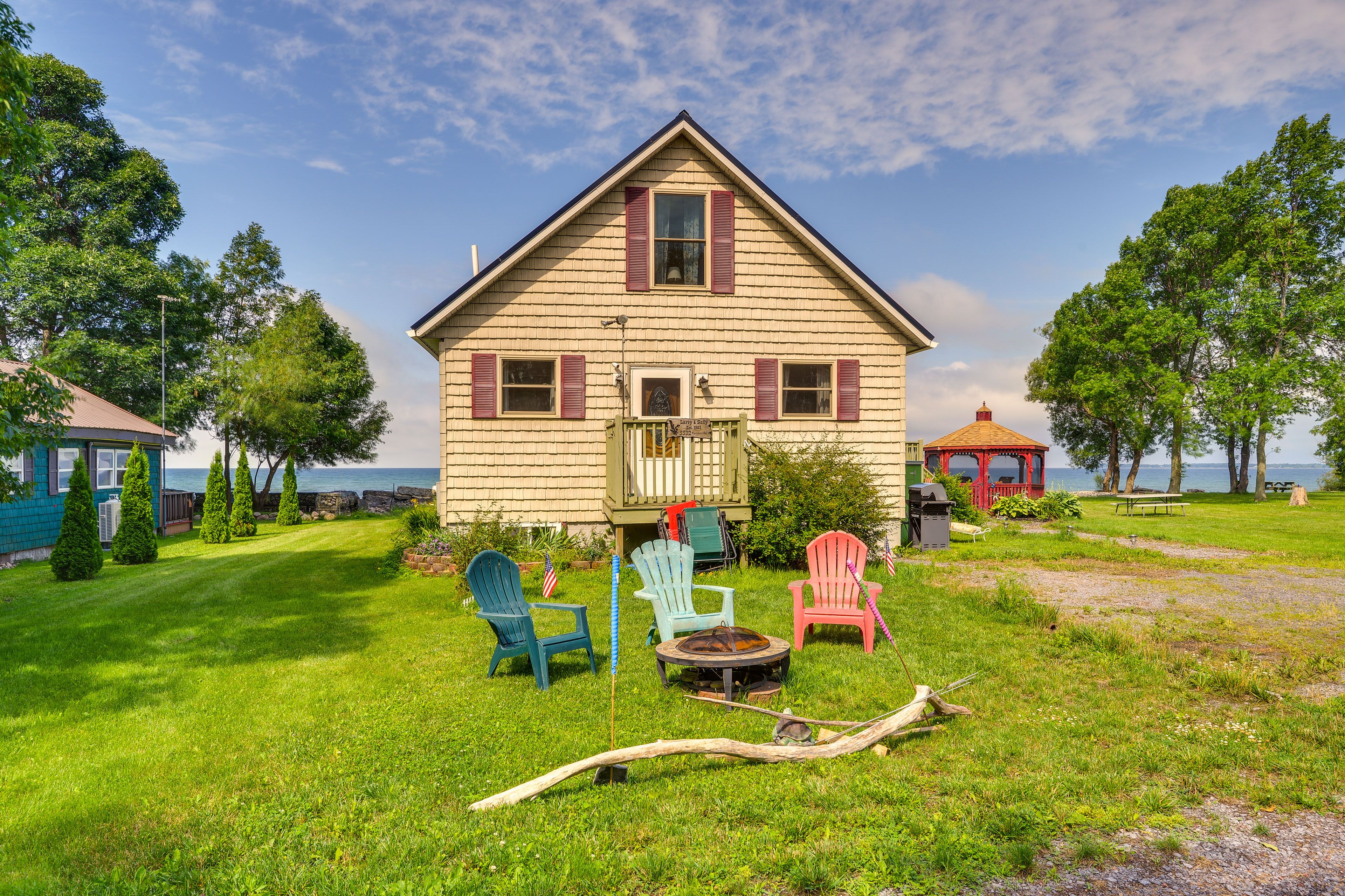 Cottage Exterior | Fire Pit | Lakefront
