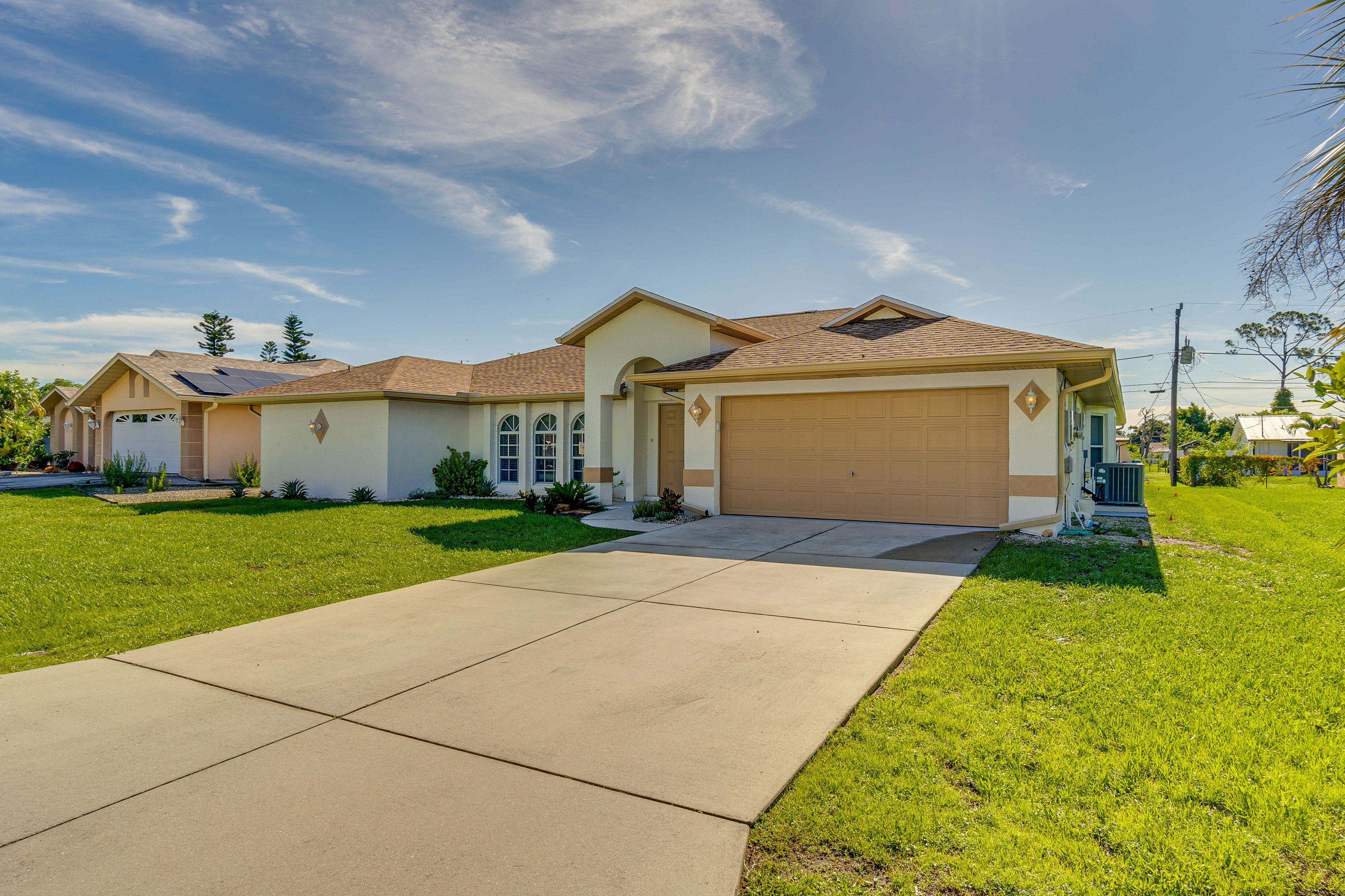 Property Exterior | Garage (2 Vehicles) | Driveway (2 Vehicles)
