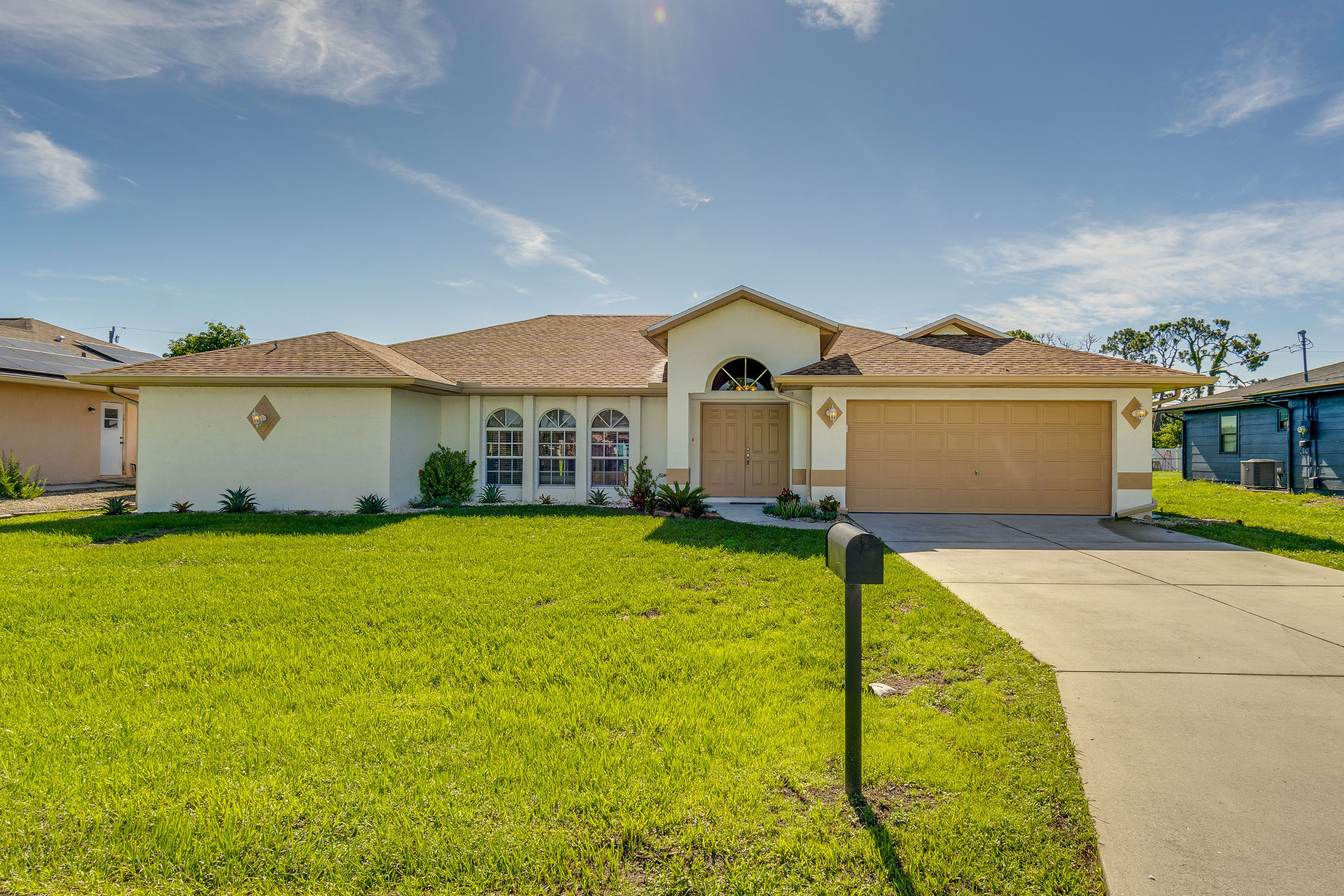 Port Charlotte Vacation Rental | 3BR | 2.5BA | 2,446 Sq Ft | Small Step to Enter