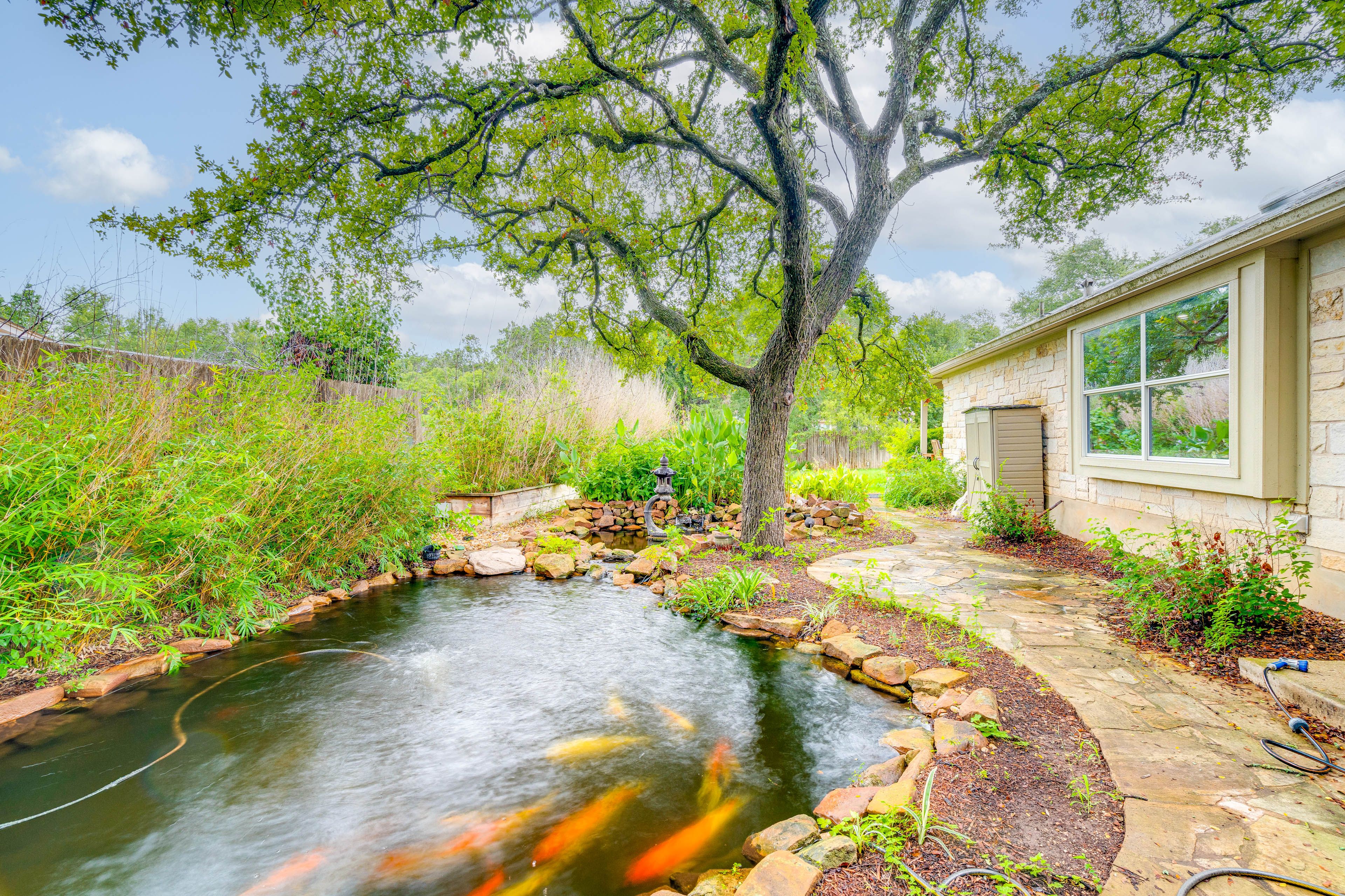 House Exterior | Koi Pond | Private Yard