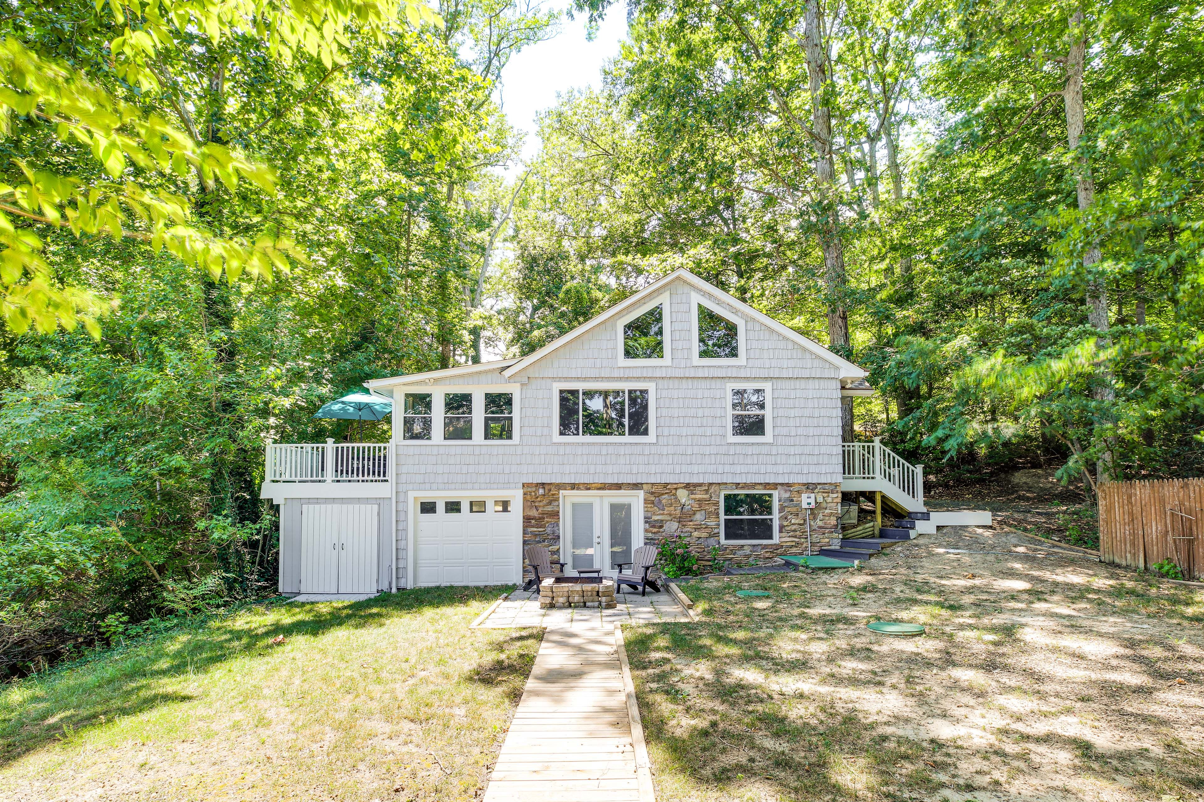 Property Exterior | 3-Story Cabin | Private Yard | Fire Pit