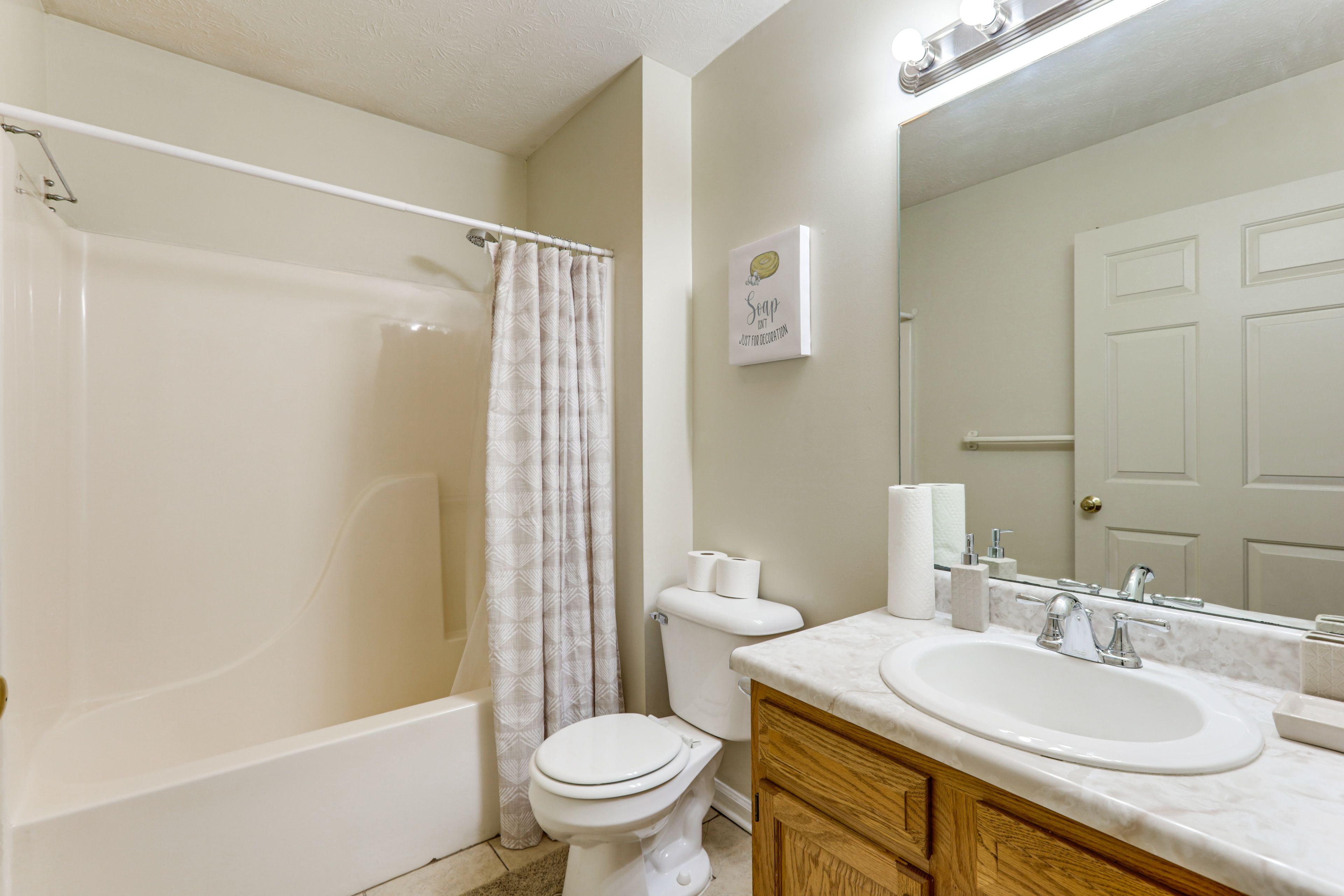 En-Suite Bathroom | Towels & Linens Provided