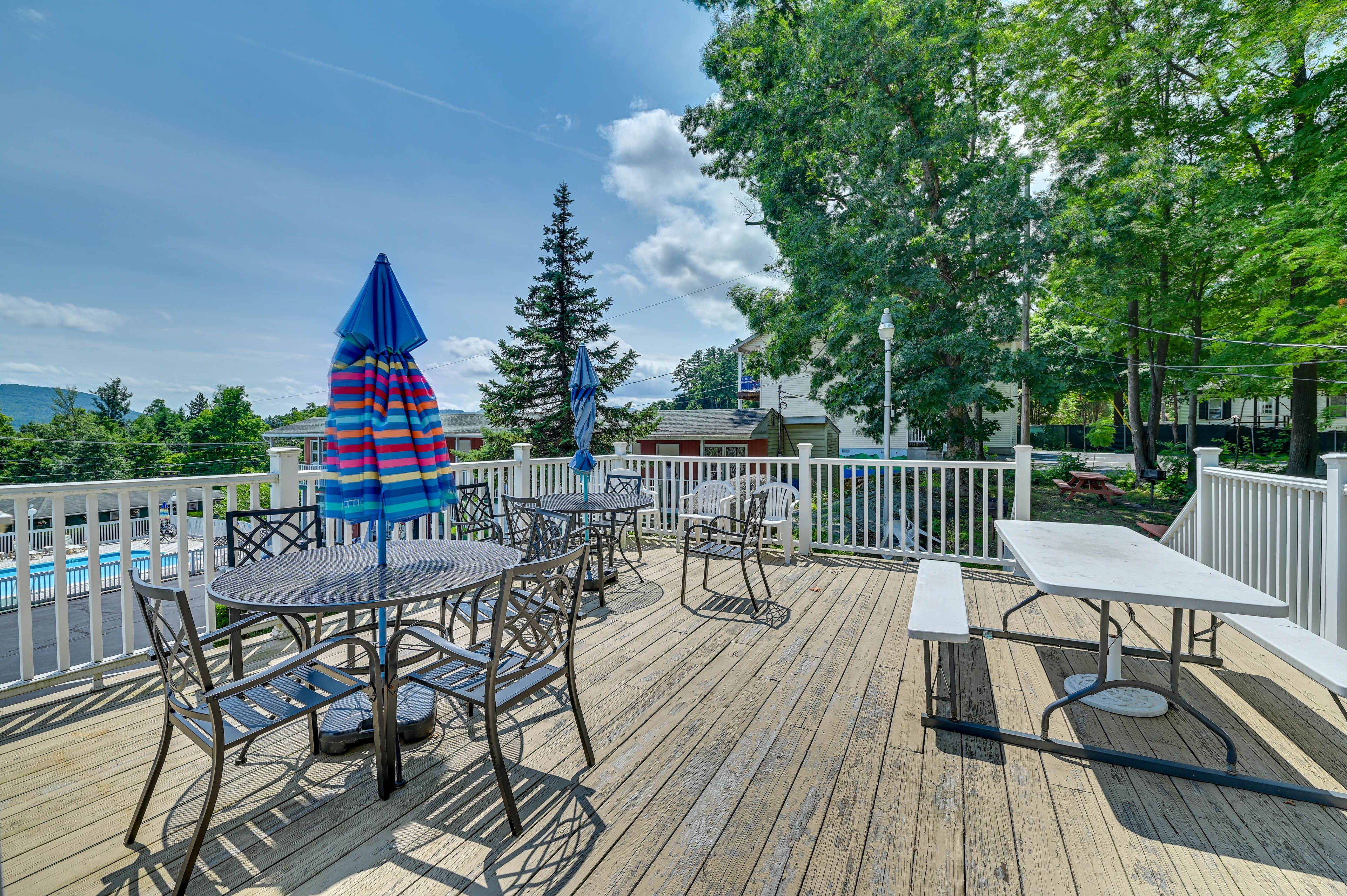 Community Deck | Outdoor Dining Area | Charcoal Grills